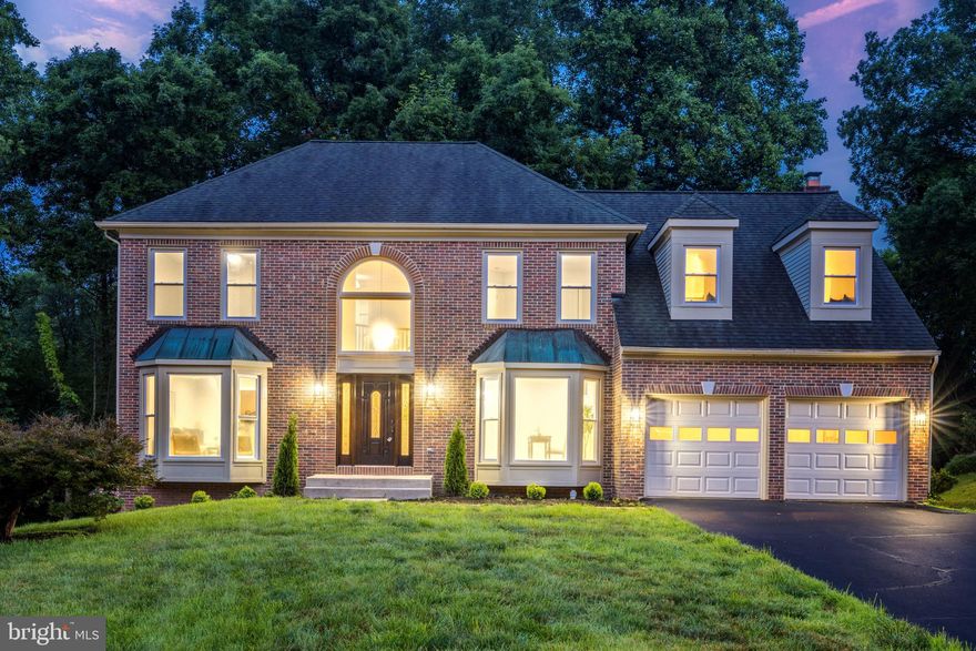 Introducing 655 Old Hunt Way, an impressive & fully renovated custom colonial boasting over 4,800 square feet on three levels in one of the most desirable neighborhoods in Herndon. Designed with extraordinary attention to detail, this home features top of the line designer lighting, high end appliances, and elegant finishes throughout. The main level offers wide plank white oak hardwood flooring, brand new recessed lighting, formal living + dining, an oversized family room w/ access to the brand new deck, a laundry room w/ folding space & sink, a wet bar, & a separate office space. The fully renovated kitchen is highlighted by an oversized island that is perfect for entertaining,  brand new custom cabinets, SS appliances, a custom farmhouse style hood, & quartz countertops with tons of storage space. The upper level offers 2 large guest bedrooms with fresh carpet, an updated hall bath, & a third ensuite guest bedroom with fresh carpet & its own newly renovated full bathroom. The upper level primary suite boasts white oak hardwood flooring, a MASSIVE walk-in owners closet, and a spa like owners bathroom complete with a double vanity, a stand alone soaking tub, a water closet, & a custom built walk-in shower w/ a rain shower head. On the fully finished walk-out lower level you will find two large recreational/flex spaces, a brand new full bathroom, a 5th legal bedroom with a brand new egress window + back slider door, as well as fresh paint & carpet throughout. **Notable upgrades include a full 3 level renovation of the entire house (2023), brand new windows with a lifetime warranty (2023), newer roof (2016), newer HVAC system (2016), a brand new deck (2023), fresh carpet & paint throughout (2023), & brand new landscaping. Located in the coveted Fairfax County School district, the home is zoned for Herndon Elementary School, Herndon Middle School, and Herndon High School. Enjoy all that Herndon has to offer with downtown festivities like the annual Herndon festival, the farmers market, fireworks, and the free summer concert series ‘Friday Night Live.’ Conveniently located just minutes to Dulles International Airport, many metro and bus stops + commuter roads such as 286, route 7, the toll road, and route 28.