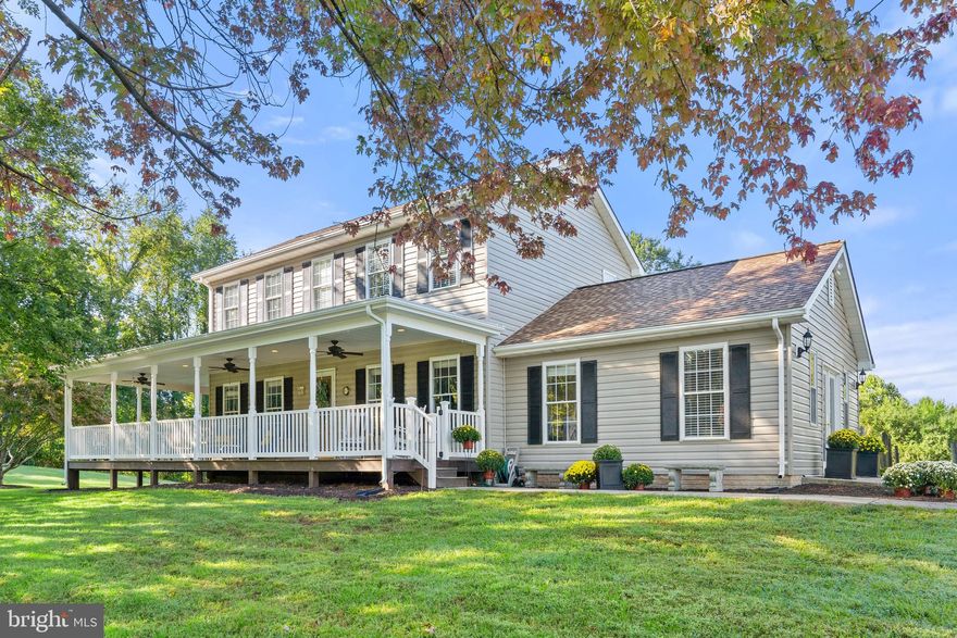 Inviting Farmhouse Offers a Unique Country Lifestyle!   The wraparound porch on this charming farmhouse will seriously make you want to sit down, relax and enjoy the sound of breezes whispering through the shady maples.    Sited for privacy on three acres of open, gently rolling land, this home invites you into its cozy spaces.  
  
The kitchen is sunny & cheerful with painted cabinetry, gas cooking and stainless appliances, making this a very pleasant space to prepare meals and enjoy time with friends & family.  With the Keeping Room and Dining Room just off the kitchen, the chef is always part of the  activity.    

Handsome engineered wood floors with a walnut stain lend rustic elegance to the main level.   The family room is a favorite in this house and tends to be the most popular room to gather and relax together; and, with several windows and French doors, there is plenty of natural sunlight.  

Adjusting the builder’s original plan for the upper level from 4 bedrooms to 3 allowed for a very spacious Owners Suite, as well as two walk-in closets:  one has been upgraded to include closet organizers and a fancy chandelier.  The adjoining bathroom features a large vanity, garden tub, linen closet, and a separate shower.

The Lower Level features a recreation room which walks out to a fenced back yard, plus an additional multi-purpose room, that is ideal as a craft studio, den or exercise room.  There is also a utility room with storage.It must be said that the most loved room in this house happens to be outside!   The current owners added an absolutely dreamy wrap-around porch, creating an abundance of outdoor living space!    It is large enough for plenty of comfy porch furniture and has been a wonderful place to relax and enjoy the scenery.  
  
The lawn is lush and green, and dotted with mature trees, including a beautiful weeping willow out front.   When the weather heats up, life is focused on lazy days of cookouts and cooling off in the pool.     The land is fully useable and truly ideal for gardening, games, a fire pit, pets and even a few farm animals.  With no HOA, you can truly live as you please!    
 
Eliminate the commute and work successfully from home with Comcast for internet and room for a comfortable home office!     Then use the spare time to enjoy all that this beautiful area has to offer: hike the Blue Ridge in the Shenandoah National Park; kayak or fish the Rappahannock River; take yoga classes in the pavilion at Wollam Gardens;  learn to ride horses; or enjoy a pint at Death Ridge Brewery.   

Here you’ll find a unique country lifestyle, close to all the conveniences of town.   An excellent location near the charming & historic towns of Warrenton and Culpeper, near the tiny & historic village of Jeffersonton.   TAKE THE 3D TOUR!   And, please ask for a detailed brochure.