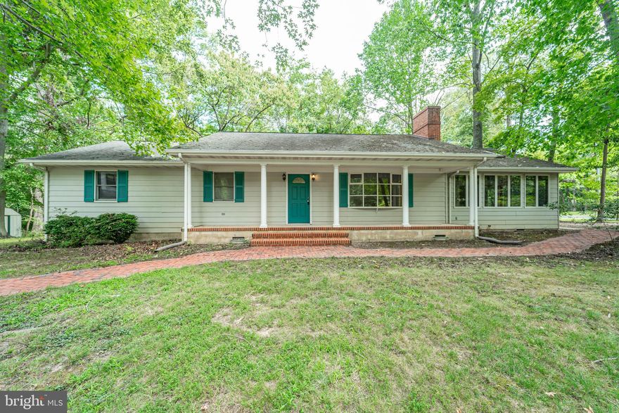 Chesapeake Landing - This home is featured on a corner lot with large living space and additional space above the detached two car garage.  Opportunity is knocking at this property, for you to make your forever home.  The home features a beautiful sunroom to entertain in as well as a large family room.  This home has a large laundry room that is a must have!  The hardwood floors are just another great feature of this home.  Call today for your showing appointment.