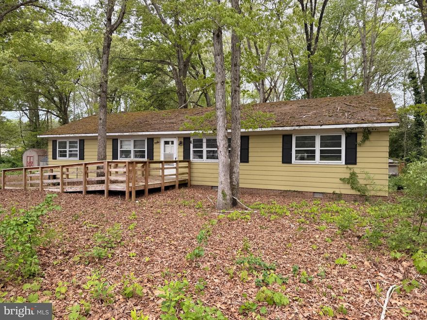 Unique investment and redevelopment opportunity on a 1.38± acre corner lot zoned I-2 Heavy Industrial, located at the corner of W Naylor Mill Rd & Paleo Ln, directly adjacent to Northwood Industrial Park and the Henry S. Parker Athletic Complex.

The offering includes two parcels (2402 & 2404 Paleo) currently utilized as residential properties but situated in a highly desirable industrial corridor. While the properties are presently within Wicomico County limits, they are immediately adjacent to the City of Salisbury boundary, with city water and sewer lines running directly in front of the property, presenting potential future utility and annexation considerations.

Existing improvements include two primary structures:
• A ranch-style home
• A former church facility that has been converted to residential use, which crosses the center lot line of both parcels
• Multiple accessory sheds

Both main structures require significant renovations. The property is potentially served by a shared well and septic system between the two parcels.

Property is being sold strictly AS-IS, with no repairs or improvements to be made by the seller. Buyers are encouraged to conduct their own due diligence. All questions regarding zoning, permitted uses, annexation, and access to public water and sewer should be directed to the appropriate government authorities.

Ideal for investors, developers, or owner-users seeking industrial-zoned land in a strategic Salisbury-area location with strong surrounding infrastructure and future potential. Enterprise benefits available for commercial uses.