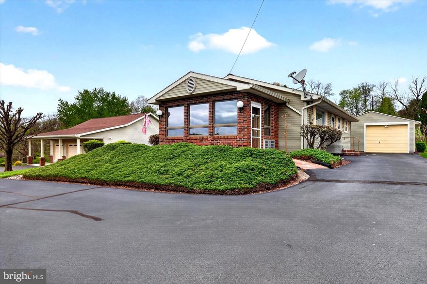 Welcome to 1472 & 1474 Bearcat Cove—your private retreat inside the gated Lake Wynonah community in Auburn, PA. Surrounded by nature and designed for comfort, this property offers a rare blend of accessibility, flexibility, and standout custom features. 

This thoughtfully designed ranch offers handicap-accessible living throughout, including a walk-in shower and an easy-flow layout. The main level features custom finishes, stainless steel appliances, and a warm, inviting feel with beautiful American Blackwalnut trim. A third bedroom can be easily added back into the home if desired.

The finished lower level is built for both function and entertaining, featuring full stone tile flooring, a custom-built bar, and a one-of-a-kind half bath with bamboo wood walls and a metal ceiling. Two propane stoves—one on each level—along with interior and exterior heat pumps provide efficient, and year-round comfort.

Additional upgrades include multiple water filtration systems and a custom secondary electrical sub-panel, this runs a portable generator for the entire home, giving you added capability and peace of mind.

Outside, the property is fully landscaped and professionally maintained. In addition to the 2-car detached garage, you’ll find an expansive 6-car garage with insulation, water, and electricity—ideal for storage, hobbies, or future possibilities.

An additional parcel (1474 Bearcat CV, Tax ID: 28-23-1474) is included, adding approximately 0.3 acres of flat, usable land—bringing extra value and flexibility.

Located within Lake Wynonah, residents enjoy 24/7 gated security with controlled access, along with amenities including a swimming pool, tennis courts, basketball courts, and more.