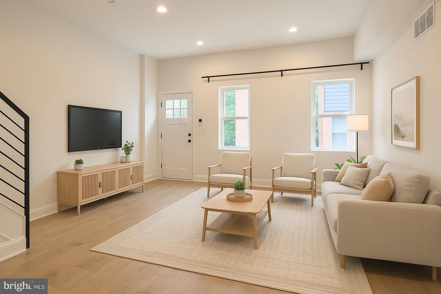 Where Style Meets Comfort in the Heart of Francisville! You don't want to miss this stunner with 6+ years of tax abatement (ending in 2032), This impressive 3-bedroom, 2.5-bathroom townhome offers 2,100 sq. ft. of thoughtfully designed living space, including a fully finished basement that can serve as a fourth bedroom, home office, or workout space. Every detail has been carefully curated to blend modern elegance with everyday functionality. Step inside to an open-concept living area with high ceilings and oversized windows flooding the space with natural light. The chef’s kitchen boasts two-toned cabinetry, sleek black fixtures, a custom backsplash, and stainless steel appliances, including a spacious island for prep and gathering. Sliding glass doors lead to your private outdoor patio, perfect for summer nights and weekend brunches. The second floor features two spacious bedrooms with ample walk-in closet space and large windows. A beautifully designed full bathroom ties the space together with black fixtures, a large vanity, and elegant ivory textured tile. The third floor is your personal sanctuary—a primary suite with a walk-through closet and a spa-like ensuite with double vanity, soaking tub, and marble hex tile finishes. And just when you think it couldn’t get better—step onto your private rooftop deck. With prime location and luxury finishes throughout, this home is a rare gem. Schedule your showing today!