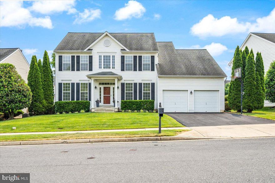 Welcome to this lovingly maintained Colonial in the Villages of Urbana!  The current owner has made some very tasteful upgrades while maintaining the original character of the home. As you approach, you immediately notice the timeless appeal of the home. As you enter, you are welcomed by hardwood floors throughout the main level and two-story foyer. The gorgeously updated eat-in kitchen has granite countertops and plenty of cabinet space! Gas stove conversion possible with gas existing in home currently. New pendant lights frame the kitchen and welcome you into the space. Open flow concept into the sunken family room, featuring a gas fireplace and an abundance of natural light. Additionally, the main level offers a formal dining room, living room and a separate laundry room.  Main level also features a home office. The upper level features a large primary suite with cathedral ceilings, en-suite bath with double vanity and soaking tub and a large walk-in closet. Light fixtures and faucets have been updated in the spacious en-suite bath. Additionally, there is NEW CARPET throughout the upper level. The upper level also offers three additional bedrooms, all with new fans, and flanked by a shared full bath. The lower level is a fully finished walk-up basement with recessed lighting and a full bath. There is ample storage under the family room side of the basement. The rear yard and deck is an entertainers dream. Enjoy a flat lot, with mature trees and fully fenced yard. Enjoy all Urbana has to offer including multiple pools, tennis courts, community Library, Seasonal Farmers Market, Pump and Rye, blue-ribbon schools and much more! Welcome home!! OPEN Thursday and Saturday!!