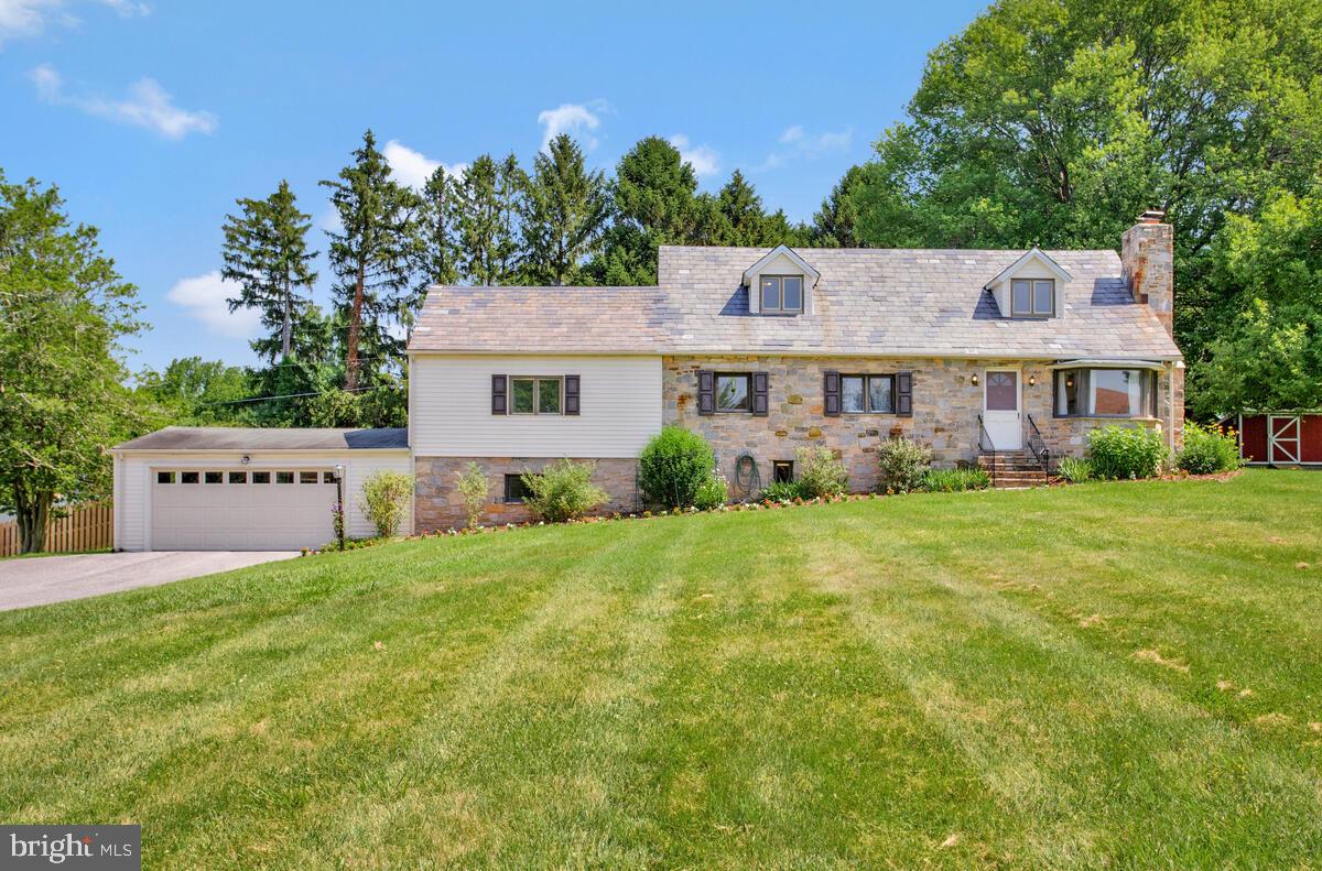 Welcome to 9814 Millwick Drive — a classic stone Cape Cod tucked away on a lush and private 0.84-acre lot in the highly desirable Chamberlea neighborhood. This well maintained 4-bedroom, 2-bath home blends timeless charm with thoughtful updates and over 2,500 finished square feet of living space.
The home’s striking stone exterior and chimney were constructed using locally sourced stone from the Marriottsville Road quarry—adding a touch of Maryland heritage to its curb appeal.
Inside, the main level features newly refinished hardwood floors (2025), a cozy living room with a stone wood-burning fireplace, crown molding, two spacious bedrooms, a full bath, and a formal dining room with a charming built-in. The kitchen offers electric cooking and direct access to a large family room addition, perfect for gatherings.
Upstairs you'll find two generously sized bedrooms with plush carpeting and a second full bath. The unfinished walkout basement with plumbing rough-in, office, workshop, and tons of storage space provides versatility and the potential for additional living space.
Major system updates include central A/C (main & lower levels)-2019, gas boiler-2019, and gas water heater-2019 for year-round comfort and peace of mind.
Step outside to enjoy the rear porch overlooking the expansive backyard—ideal for gardening, entertaining, or simply relaxing in nature. A two-car attached garage and extended driveway provide plenty of parking.
Located in the Mt. Hebron school district and convenient to Route 70, Route 29, Historic Ellicott City, and much more.
Don’t miss your chance to own this rare gem in one of Ellicott City’s most beloved neighborhoods. Schedule your private tour today!