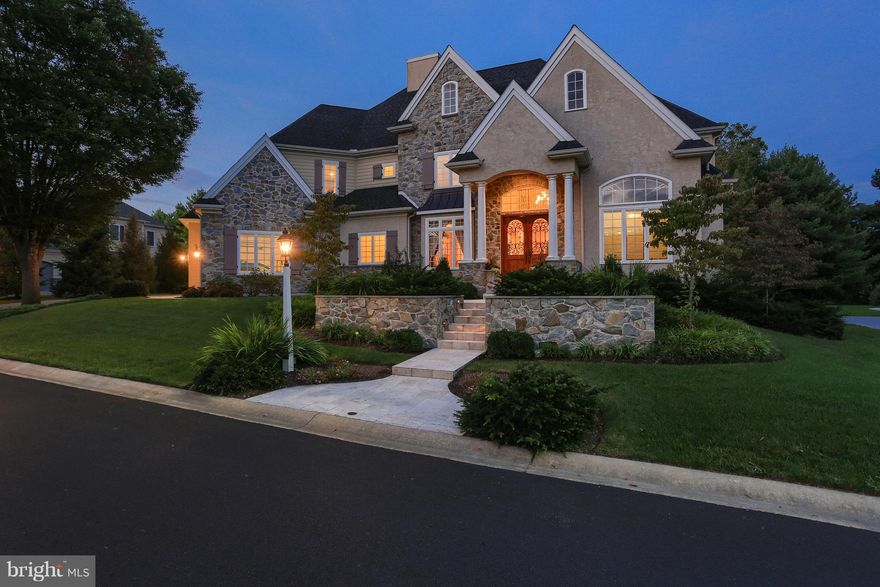Welcome Home! This is one of the most stunning homes you will  view in Lancaster County . . . The colors are warm & the decor is pristine.  You need to see this spectacular home that is like no other.  Custom, custom, custom is the perfect description for this outstanding property  including:  First Floor Grand foyer is warm & welcoming with incredible neutral colored Travertine Tile floors, custom hardwood circular staircase with lovely scroll designed wrought iron balusters, catwalk overview, custom chandelier & matching sconces.  From the main foyer, french doors lead you to a fabulous 1st floor office/library with hardwood floors, custom built-in cherry wood bookshelves & cabinetry, and huge full wall windows with arched transom drench this home with natural light.  Formal Dining-Wonderfully designed with custom scroll ceiling medallion, arched entry, custom pillars, lighted tray ceiling and Travertine tile floors.Family Room-Amazing floor to ceiling circular windows overlook the amazing outdoor pool area, hardwood floors, cozy granite surround fireplace & mantle, built-in bookshelves & cabinetry, full wet bar with wine refrigerator, and single french door access to pool area.  Kitchen-Warm, rich & beautifully appointed with custom granite counters & large tiered serving island with generous seating, hardwood floors, quaint & softly circular breakfast nook with wonderful natural light overlooking the pool area, fabulous top-of-the-line appliances include 6-burner Viking gas cooktop, grille & ovens, Sub zero refrigerator, Bosch dishwasher,  plus coordinating lighted wood cabinets &  appliance facades, custom tile backsplash, soothing custom lighting & fixtures, and tons of storage.   Family Room-Fabulous lighted coffered ceiling, hardwood floors, cozy gas fireplace with granite surround, custom built-in shelves with flat screen T.V., and sliding glass doors to outdoor patio.  Powder Room & Mud Room- Unique, convenient & lovely with custom fixtures & lighting, ample  cabinetry & storage.   Master Suite- Lighted tray ceiling and bookshelves, hardwood floors, pleasant sitting area, generous walk-in closets with built-in shoe boxes and tiered clothing racks.  Master Bath will take your breath away with full his & hers separate vanities, peaceful Jacuzzi garden tub, splashy walk in tiled shower with convenient built-in seating.  Second Floor:  Playroom/Den- Wall to wall carpet; a nice private place to hang out & read, watch T.V. or play games. Bedroom #2- Hardwood floors, corner windows & large walk in closet.   Bedroom#3- Hardwood floors, large walk in closet, and pretty windows.  Full Bath- Dual sinks & large vanity with lots of storage space.  Bedroom #4- Hardwood floors, circular 3-bay window, and large walk in closet.  Full Bath- Dual vanity, large shower & tub, and convenient linen closet.  Craft Room/Game Room- Hardwood floors, Large storage closet, recessed lighting, dual wall counter spaces and loaded with built in cabinets.  Full Bath- Main hall bath is lovely & spacious.  Outdoor:  Incredible Olympic sized pool & exhilarating 7-person hot tub, stamped concrete patio with built-in seating, grand outdoor fireplace, custom outdoor lighting,  service bar with seating,  full kitchen & Bar-B-Que grille, and several conversation areas for private seating.  Finished Lower Level-Hardwood floors, incredible full custom wood & granite bar, built in flat screen T.V. and  custom stools for seating.  Custom Media Room offers plush wall to wall carpet, large movie screen & projection equipment, theatre seating, and full 2nd kitchen/snack room make this an authentic theatre experience.  Add to this a raised stage area with hardwood flooring & theatre curtains, Exercise Room with hardwood floors & full mirrored wall, custom wine cellar, and full bath.  Large, oversized 3-car garage with lots of added storage space.  WOW, this home has it all !