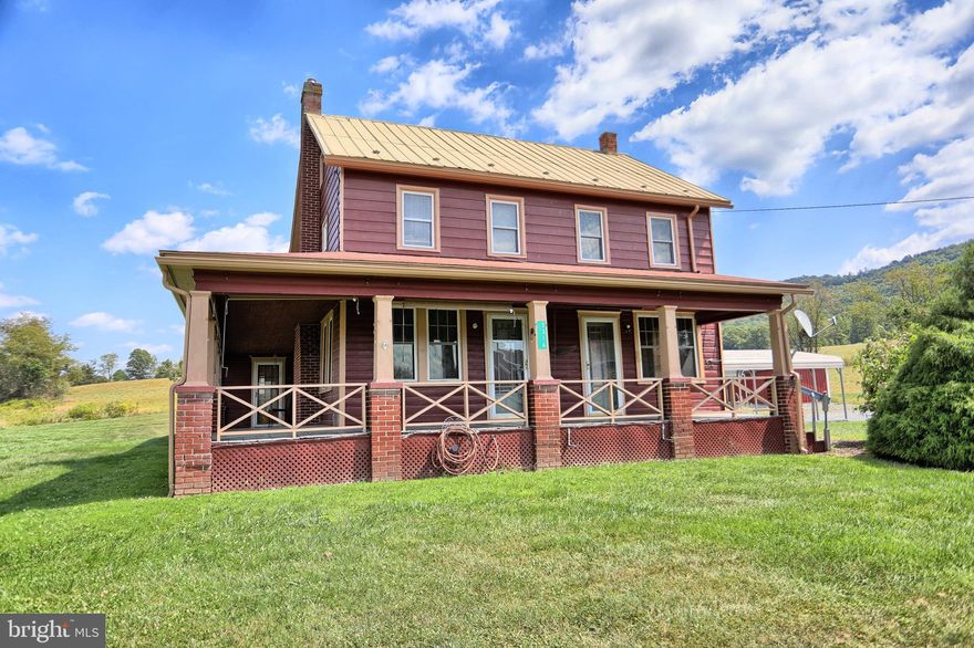 New Year, New Home?  This late 1800's 5-bedroom home, originally part of the family farm, has preserved many of the unique features of farmhouse living with its wrap-around porch, front and back staircases, "farm kitchen" dining room and much more! Built for family, the 2nd floor layout, with generous hallways and unique built-ins, easily accommodates a front and back "wing" for privacy.  Full bath includes walk-in shower stall and functional vintage tub. Rural setting creates breathtaking views and open sky for stargazers. Two-car garage offers space for the car enthusiast or hobbyist, and 2-car free-standing carport provides an extra protected parking from summer sun and winter snow. Just minutes from downtown McConnellsburg and Fulton County Medical Center. Let your imagination run wild and make this home your own with some TLC and elbow grease! Home is being sold AS-IS. Motivated Seller. *Property has been winterized*