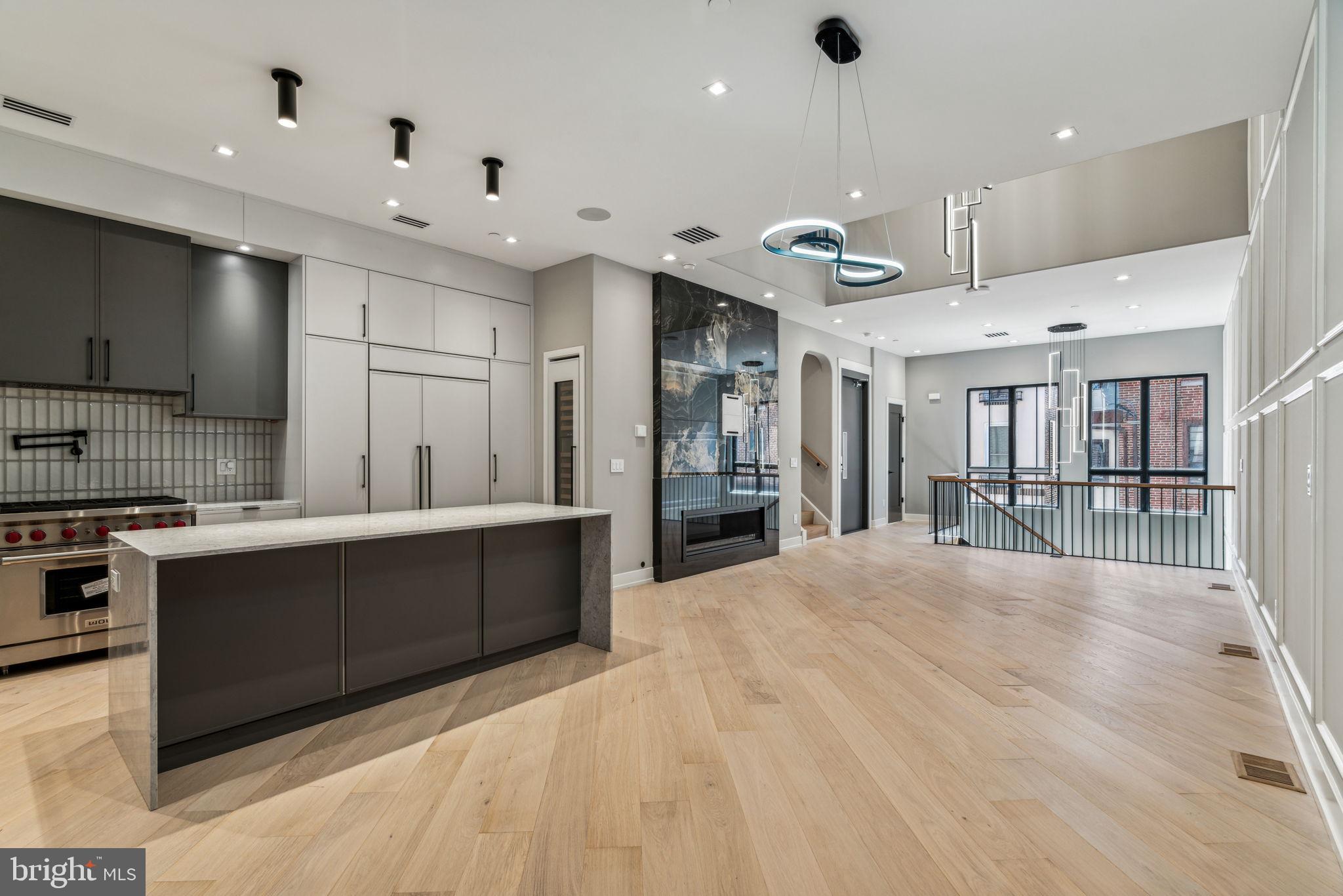 Rittenhouse Square new homes with 2-car garages, elevators, multiple outdoor spaces, 10-year tax abatement, and within the Meredith School Catchment. Located on an iconic street of Philadelphia, where some of the most historic homes are located, comes a new presence, Bowery Place. Each home stands 46’ high which allows dramatic ceiling heights and massive windows throughout. This community was expertly designed by award winning GNOME Architects and brought to life by ZATOS Investments & Construction. Each home features four bedrooms, four full bathrooms and two half bathrooms. There is no missing amenity as all homes include, gas fireplaces, and incredible finishes from the herringbone flooring in the living room to the custom cabinetry throughout. Designer fixtures and custom woodwork can be found on every level of the home. Live in the center of it all. Walk to the Square, the Avenue of the Arts, PENN and the hottest restaurant row in Philadelphia. Taxes and square footage is the responsibility of the buyer to have verified. Homes do include new tax abatement.
