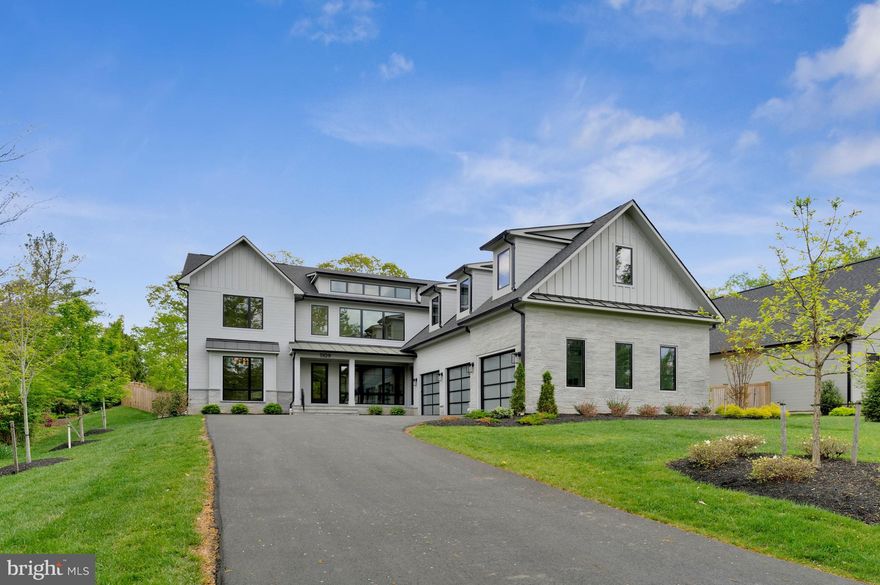 New construction by Reel Homes offering nearly 10,000 square feet of thoughtfully designed living space in the heart of McLean, at a tremendous value for the size, finish level, and location.

This custom home blends scale, functionality, and craftsmanship with 10’ ceilings, 8’ doors, wide-plank flooring, and a seamless open layout built for everyday living and entertaining. The chef’s kitchen is anchored by a 6-burner Wolf range, Sub-Zero refrigeration, and custom flush inset cabinetry, opening directly to the family room.

A rare main-level bedroom suite provides flexibility for guests or multi-generational living, complemented by a private office. Upstairs, spacious en-suite bedrooms are anchored by an exceptional primary suite that is generous in scale, with a private sitting area, a true spa-style bath with cathedral ceilings, and an oversized walk-in closet that feels more like a luxury boutique than storage.

The lower level is designed for real use, with natural light, recreation space, media area, wet bar, fitness room, and an additional bedroom suite.

Outdoor living is equally strong with covered porches, a screened-in porch with fireplace and heaters, and a flat backyard with room for a pool. Elevator, generator, irrigation, and a 3-car garage round out a highly complete offering.

Centrally located within the Churchill > Cooper >  Langley school pyramid and just minutes to downtown McLean, Tysons, parks, and major commuter routes.