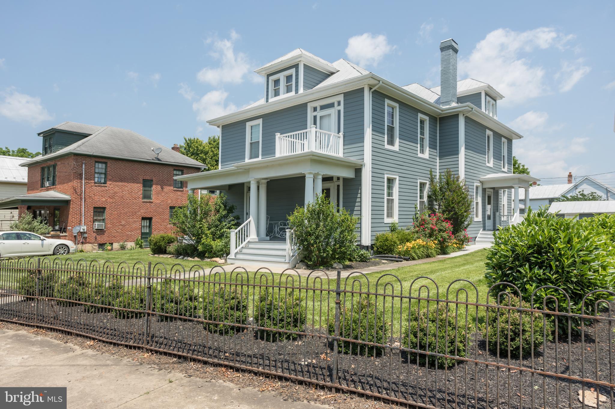 Elegant Downtown Moorefield Living! This colonial beauty blends classic charm with all the modern updates you need—right in the heart of Hardy County. Over the past few years, it’s been completely refreshed from top to bottom, with no detail left untouched. We’re talking brand-new heating and cooling systems, updated plumbing and electrical, stylish bathrooms, and a stunning kitchen that’s been completely redone.
Step inside and you’ll instantly see the character of this home shine through original six-panel doors, charming doorknobs, beautiful staircases, and those classic transom windows above the doors. Hardwood floors stretch through the main level and up the stairs, adding a warm, welcoming feel throughout.
The kitchen is definitely the heart of the home, with quartz countertops and top-notch appliances that make cooking and entertaining a breeze. When the weather’s nice, take the party outside to the back patio, where you’ll find an outdoor kitchen, bar seating, and plenty of space to relax with friends and family.
Inside, the formal dining room—with its built-in China cabinet—easily fits everyone for holiday meals or cozy dinners. Upstairs, the primary suite is a quiet retreat with a beautifully tiled walk-in shower, while two additional bedrooms and another full bath round out the second floor.
One of the best features is the fully finished attic. With two built-in California king beds, a kitchenette, and a full bath that has a dual-head walk-in shower and soaking tub, it’s a perfect spot for guests, movie nights, or just hanging out. There’s even a fun little nook with bean bags for gaming or relaxing.
Location-wise, you can’t beat it—right in the heart of downtown, close to shops, restaurants, and everything else Moorefield has to offer. If you love the outdoors, you’re also close to the South Branch of the Potomac River, George Washington and Monongahela National Forests, ski resorts, Seneca Rocks, and Dolly Sods. Local parks are just around the corner for morning jogs or evening strolls.
The home is currently a thriving short-term rental, but it’s ready for whatever you have in mind—your forever home, a bed and breakfast, or an investment property. Additional rental info is available if you’d like to keep it going!
Don’t miss out—come see what Downtown Moorefield living is all about and schedule your showing today!
Pictures and Video coming soon.