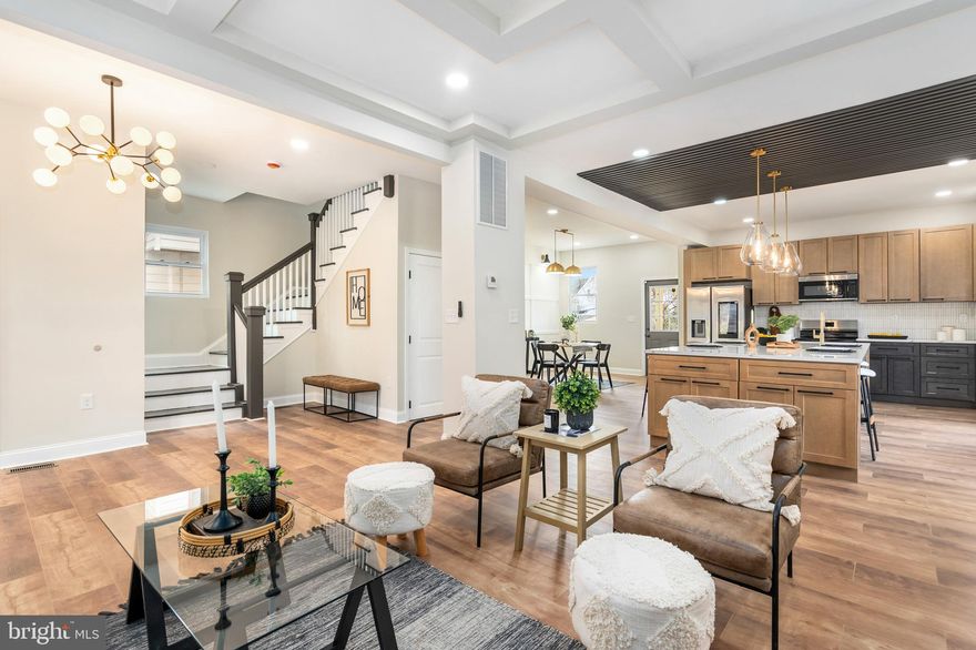 Welcome to 4211 Liberty Heights Ave, a beautifully renovated home that blends classic charm with modern elegance! This spacious property has been completely updated from top to bottom, offering turnkey living in a prime Baltimore location.

Step inside to discover an open and airy floor plan with brand-new flooring, recessed lighting, and stylish finishes throughout. The gourmet kitchen is a chef’s dream, featuring sleek quartz countertops, stainless steel appliances, custom cabinetry, and a stunning backsplash. Perfect for entertaining, the bright living and dining areas provide plenty of space for gatherings.

Upstairs, you'll find generously sized bedrooms with ample closet space and luxuriously updated bathrooms boasting modern fixtures and designer tile work. The fully finished basement offers additional living space—perfect for a family room, home office, or guest suite.

Outside, enjoy a spacious yard with room for outdoor entertaining and off-street parking for added convenience. With brand-new HVAC, plumbing, electrical, and more, this home offers peace of mind and maintenance-free living.

Located near parks, schools, shopping, and major commuter routes, this home is a must-see. Don’t miss the opportunity to own a like-new home in a well-established neighborhood!