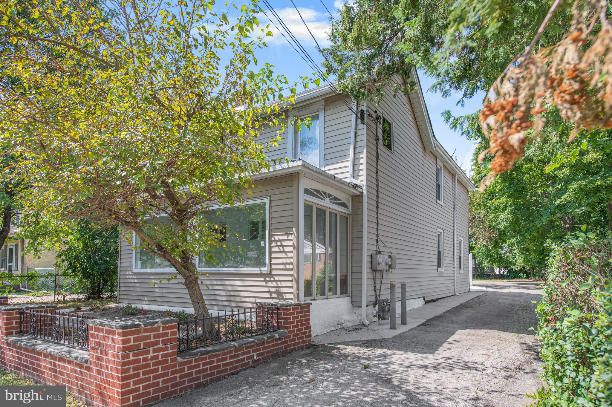 Home sweet home! This charming duplex property is a perfect addition to your portfolio or a new place to call home. Featuring a welcoming enclosed front porch with ample living space, this property is sure to be a favorite. Step through the front door into the front unit and notice the beautiful flooring and kitchen, which boasts abundant cabinetry. Towards the rear, you'll find your laundry area, half bath, and a cozy outdoor paved space and yard perfect for relaxation. The second floor offers three generously sized bedrooms, as well as a full bathroom. The rear unit is complete with 2 bedrooms, Full bathroom and living space. This property is quite unique. Conveniently located near a variety of restaurants, stores, and more, this property is a must-see. Add it to your list and book your appointment today!