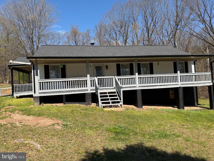 This beautifully appointed totally remodeled 2/2, 1344 sq ft home w/ full unfinished basement on 5 + acres in wild ,wonderful Hampshire Co is a real gem !  206 Mountain View Dr has so much to offer starting with a brand new roof w/ 50 year transferable warranty, new gutters and leaf guards, new heat pump w/ 5 year warranty new hot water heater w/ 6 year warranty, new flooring, new custom cabinets, new water line, new water softener, new entry doors, new oil tank, and a new media wall w/ big screen TV ,fireplace and quick touch lights! Additionally there is fiber optic high speed internet, a new security system w/ cameras, carbon monoxide, water and temp sensors. There is also a great oversized 2- car detached garage w/electric . This property also conveys fully furnished right down to the Cub Cadet riding mower so just bring your toothbrush and start living your best life ! This is single -level living at it's finest and you'll have a hard time finding a nicer home with a bonus location at the very end of the road ! So come out to Wild, Wonderful , West Virginia and get this amazing slice of " Almost Heaven " before someone else gets your slice of the pie !