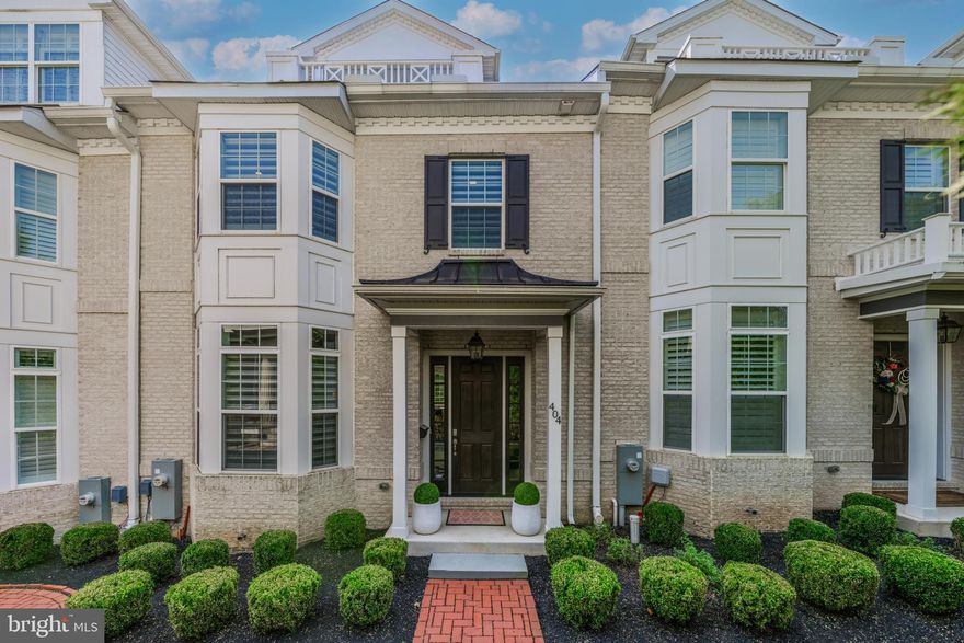 Elegant living in the heart of West Chester Boro! The Town Walk at Church and Dean community offers a sophisticated courtyard lifestyle with stunning Italianate architectural design. At 404 S Church St, you’ll find an exquisitely finished 4-level townhome with a covered front porch, rooftop terrace, and bay windows. The main living level features an open concept floorplan with luxury finishes that blend style and function, including a gourmet kitchen with a large center island, plenty of bar seating, pendant lighting, and a Palladian window that offers beautiful natural light. A stunning space for entertaining, the family room features a gas fireplace with modern shiplap surround and custom mantel. The back deck is situated just off the kitchen, allowing your indoor festivities to move seamlessly outside. A convenient powder room is also located on the main level. The bedroom level features 3 bedrooms and 2 full bathrooms, all beautifully appointed, and the owner’s bedroom features 2 walk-in closets and a luxury en suite bathroom. The top floor features an office space and second den complete with wine fridge and direct access to the rooftop terrace, the perfect spot to enjoy stargazing while overlooking Church Street and the courtyard. Downstairs, there is a versatile bonus space that would make a wonderful rec room, fitness room, library, or so much more. You will also find even more closet space and direct access to the 2-car garage at the back of the home. This is a low-maintenance lifestyle within walking distance of Everhart Park as well as the shops and restaurants on Market and Gay Streets. Request a personal tour today!