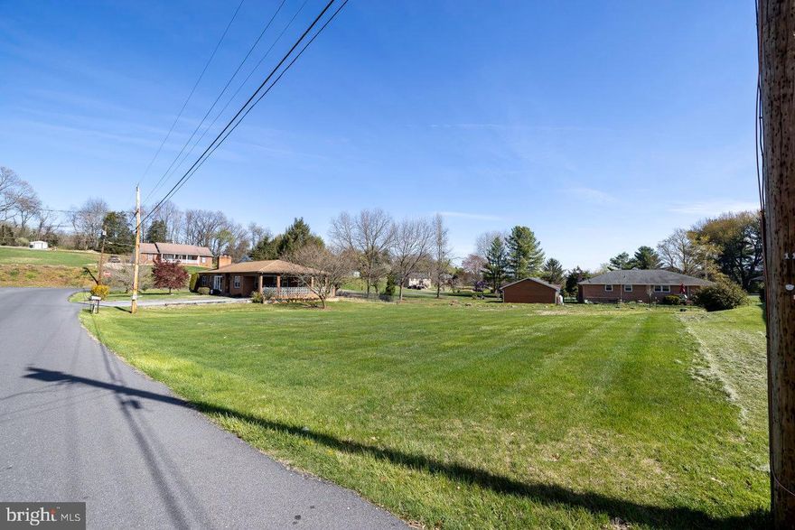 Nice open flat building lot with town water & sewer available in Hudson Subdivision.