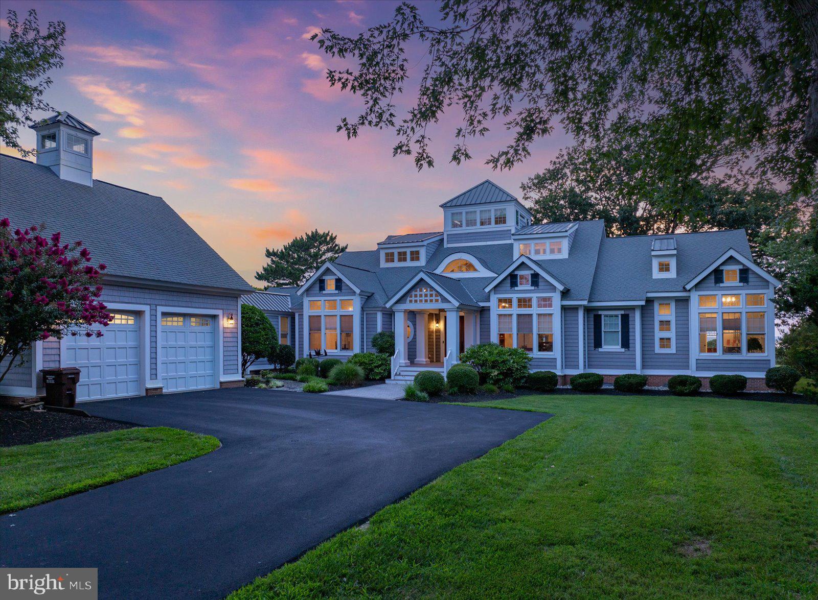 Perched on 2.95 acres, this Serene, Picturesque setting offers an Unparalleled Living Experience and Breathtaking Views of the Shimmering Bay. This 5125 Sq ft Architectural Masterpiece is just not a Home, it’s a Lifestyle. Every detail has been carefully considered to create a Residence that is both Luxurious and Inviting, where Beauty can be enjoyed from every corner. Features include: Total Four Car Garage(s) with Separate Climate Controlled Carriage Garage with loft, 600 amp service, Generator, Geo Thermal with Air and Humidity Purifier, Large Utility Mechanics room, spacious Laundry room with Sink and Cabinetry, Solid Core 8 foot Doors, Cherry Hardwood Floors, Eat in Kitchen, Dovetail Kitchen Cabinets, Granite Counter tops, Kitchen Island with surround Cabinetry, Separate Eat up Island Bar with Cabinetry, 6 foot SS Refrigerator, 6 Burner Gas Cook Top, SS built in Microwave, Oven and Warmer, oversized Pantry, Grand Great Room with Wood Burning Fireplace, Vaulted T&G Ceiling, First Floor Owner Suite has Gas Fireplace, Gracious Walk in Closet and Oversized Bathroom featuring all Tile 6'x8' Multi- head Shower, stand-alone Soaking Tub and Make-up Vanity, detailed Moldings throughout, Capacious Entertainment Room which leads to the Slate floored Screened Porch that boasts a Wood Burning Fireplace and spectacular views of the Bay. In addition, there is a separate Dining Room / Living Room, top floor Lighthouse Observation Room with built in seating, Office with Cherry Cabinetry, unfinished 24' x 24' Storage Room or additional Bedroom with separate entrance. The exterior offers Black Top Driveway, Hardscaping, Multiple Exterior Bayview Porches, Professional Landscaping, Outdoor Shower and Fenced Yard area. To top it off, the Shoreline is protected with a nice Sandy Shoreline Beach as well, Pier dock with Multiple Boat slips that are serviced with both electric and water and includes a Fish cleaning table. Every detail was thought out to provide a True Example of Experiencing Coastal Living at its Finest.