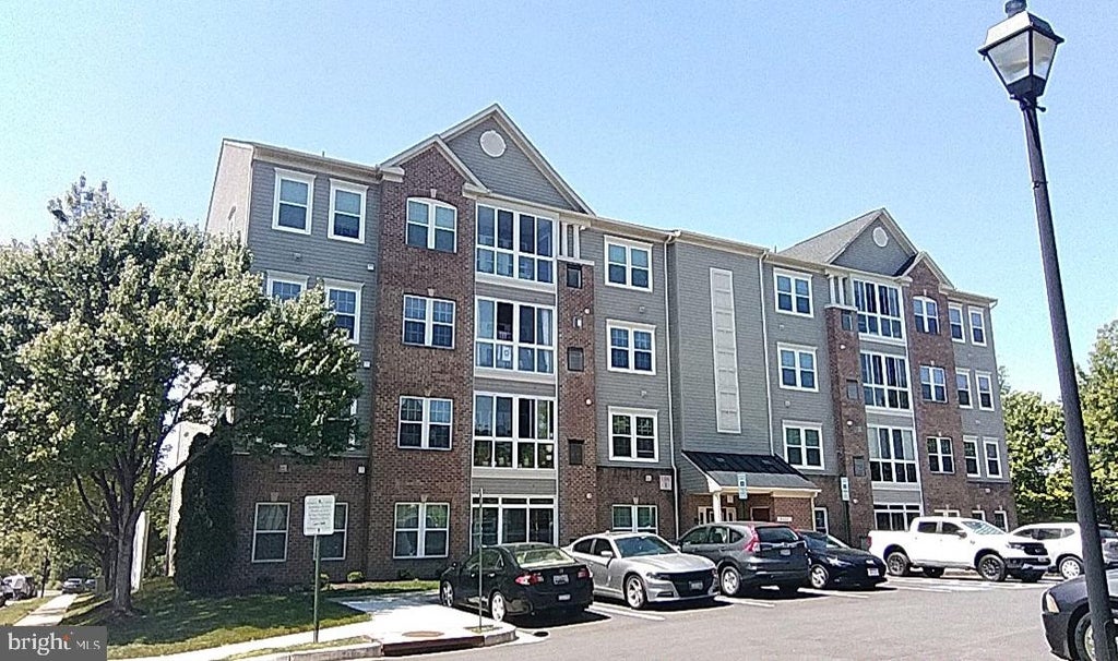 Photo of 8460 Ice Crystal Drive #K, LAUREL, MD 20723 (MLS # MDHW2073280)