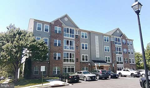 Photo of 8460 Ice Crystal Drive #K, LAUREL, MD 20723 (MLS # MDHW2073280)