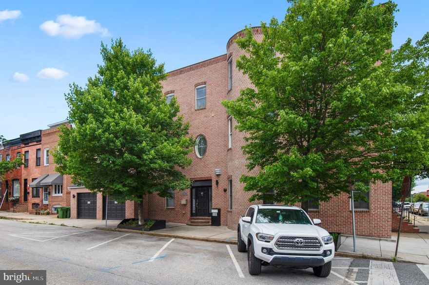 Experience luxury at 3000 Hudson Street, a Canton treasure that redefines city living.

This architecturally stunning three-bedroom, two-and-a-half-bath townhome features breathtaking details and impeccable design across multiple floating levels. The current owners have substantially enhanced this already special space.

With its distinguished frontage on South Potomac St., this home is one that neighbors notice. Perhaps its most defining feature is the turret wall that extends from the exterior and provides an equally unique bonus space on the inside.

Enter into the bright foyer which stands at the foot of a spiraling staircase. To your right through the arched doorway is a huge formal living room. To your left is the laundry room, which leads to a two-car garage.

Up a few stairs, you will find the dining room which opens up to a gorgeous dark-toned kitchen. Up a few more steps are two bedrooms, with the owner's suite on the top level. The top level includes a spacious family room with a sink and built-in fridge.

Step out to the first level of your two-tiered rooftop deck, also with surround sound. Sip some wine (or coffee!) with your 360 views of Charm City!

The owners have added heated floors to the kitchen and primary bath, which they took down to the studs. They put in a double shower and soaking tub, creating a distinct boutique hotel vibe.

They installed surround sound and drinking water filters throughout the house. Mecho blinds have been added in every room. Motion-activated security cameras have been hardwired on the exterior of the home. New lighting and fixtures have been added throughout including custom-made wooden chandeliers. Many more upgrades, as well.

Don't miss your opportunity to own this one-of-a-kind gem in downtown.