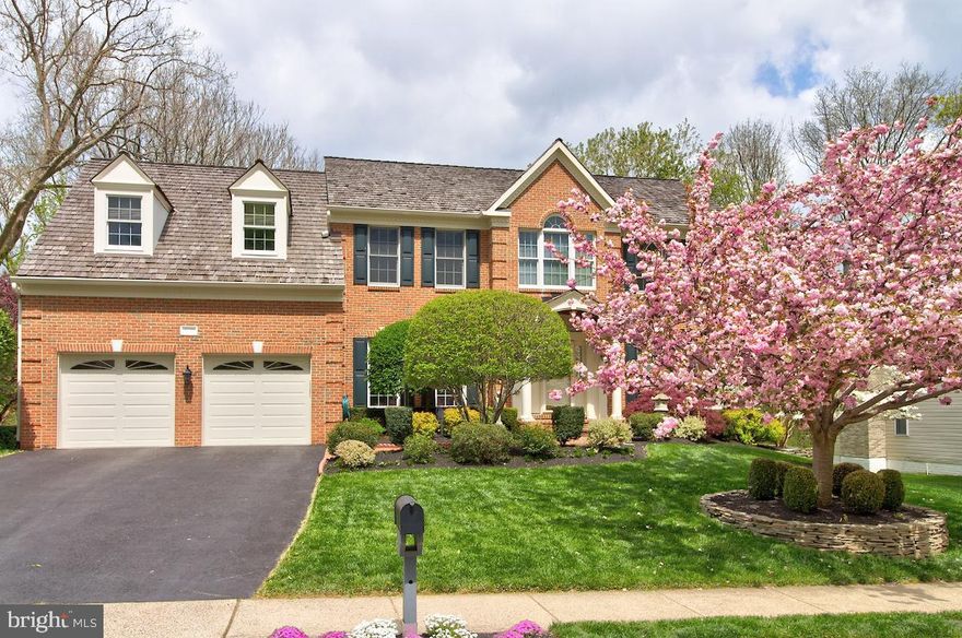 Fall in love with this gorgeous custom estate at 1227 Bradfield Drive on a magnificent low-maintenance lot with professionally-landscaped gardens and views in Woodlea Manor.  TRULY RARE is this private, custom high-end Plantation Porch (Brazilian Hardwood Decking) with views of the gorgeous yard, wood line, trees and common area.  Woodlea Manor is sought-after for its location up the street from downtown historic Leesburg with nearby new homes being built in the million-dollar range.  This home offers so much more with its mature landscaping in this sought-after community.  When you approach this home and it’s custom brick walkways, you will smile at the meticulous perennial gardens and blooming trees surrounding the property.  So loved was this home and it shows in also the beautiful updates made throughout.  The hardwood floors on the main level, custom paint throughout, new custom light fixtures, updated baths and the beautiful Gourmet Kitchen will wow you located off of the Family Room with a stone-faced gas fireplace.  Enjoy entertaining around the large island or on the private Plantation (Screened) Porch that feels like another finished living area – while you take in what is truly a unique lot and setting in Woodlea Manor.   Extensive crown moldings, built-ins and those little custom touches present this home and property in a beautiful light.  Also on the main is a beautifully-remodeled powder bath, an additional (5th bedroom has a closet) or Den/Office and a formal dining and living room - the large laundry room with newer washer/dryer has a utility sink and custom built-ins so everything has its place.  Venturing to the upper level you will find an expansive Owner’s Suite with its luxurious, updated quartz bath in today's fashion, a separate soaking tub and a custom-tiled shower.  There are 3 additional pristine large bedrooms with great views of trees from the rear bedrooms, along with an updated designer full bathroom customized with quartz.  The lower level (with full size windows) walks out where you can also access the yard as well as the deck/porch.  A large unfinished lower is framed out for a media room, game/rec room, possible 5th bedroom and has a rough-in for a full bath.  Comps are in the $900's for those with lowers finished!   A 2-car garage completes this beautiful home setting with nearby downtown Leesburg - its shops, restaurants and convenience to the Toll Road and commuter routes offers everything Buyers are searching for in Leesburg and Loudoun County’s wine and horse country.   Enjoy Woodlea Manor’s "Best of 2019" community pool and club house, walking/jogging paths (sidewalks), a playground, tennis courts nearby and more (community photos provided by Woodlea Manor HOA).  Please inquire or your Agent can see MLS for an extensive list of the beautiful updates made to this home over the past few years.  A few of them include 
 Roof, Gutters, Furnace, AC, Humidifier, Water Heater, W/D, Appliances, Baths, Kitchen, more.  *Internet is FIOS Gigabit Connection*