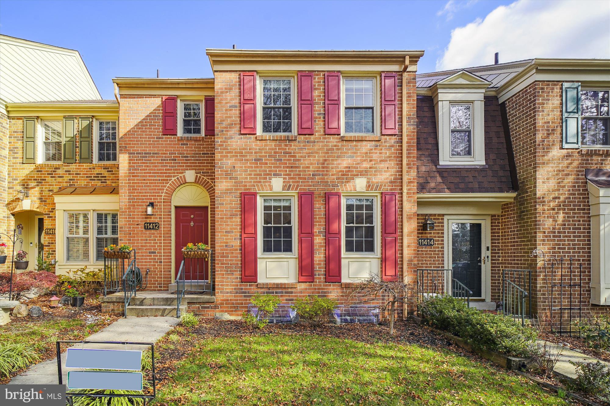 Welcome to this gorgeous townhome, situated in a convenient cul-de-sac, in sought after Old Georgetown Village. This 3 level all brick home is ideally located within blocks to Metro, Whole Foods, shops, restaurants, recreational parks and biking and jogging trails. It is open and bright w/gleaming hardwood floors on two levels and recessed lighting throughout. The updated gourmet kitchen has granite countertops, stainless steel appliances, abundant cabinetry and an eat-in area next to the windows. Open dining room with chair railing and spacious living room with fireplace is perfect for entertaining.! Upper level features spacious primary bedroom with walk-in closet and updated en-suite bathroom. There are 2 additional light and bright bedrooms and an updated hallway bathroom..The carpeted finished walk-out lower level has a 4th bedroom, updated full bathroom and a recreation room with fireplace which opens onto a beautiful private patio, One car assigned space and plenty of visitor spaces. Membership to the community pool is available. tot lots and tennis courts are steps away. This home is perfectly located very close to Pike and Rose, Montgomery Mall, downtown Bethesda , and major commuter routes: 1-270, 495, Rockville Pike, and Old Georgetown Roads.
