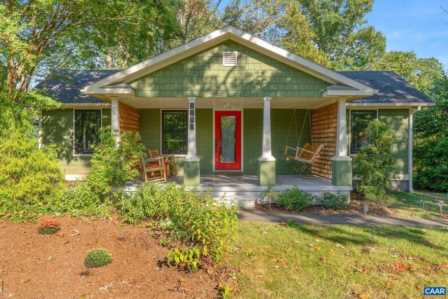 Discover this beautiful meticulously restored eco-friendly Craftsman bungalow, just minutes from downtown Charlottesville and one mile from 5Th Street Station. Nestled on almost an acre of wildflowers, it features a charming front porch swing and relaxing spaces throughout. The home offers almost zero utility costs thanks to solar panels that power both electricity and hot water. This home features top-of-the-line appliances, including a Sub Zero refrigerator, a 5-burner gas stove, a freestanding freezer, and an oversized farmhouse steel sink. Enjoy three spacious bedrooms and two beautifully tiled bathrooms. Solid wood doors, custom Prairie Style windows, and a Ventilator heat recovery system enhance its charm. The extra-wide front porch and back deck are perfect for entertaining. Plus, a separate 550 sq. ft. multi-purpose studio offers endless possibilities?use it as an office, guest space, or creative studio. With ample parking and a circular driveway, this property combines style, sustainability, and versatility in a prime location.,Granite Counter,Fireplace in Living Room
