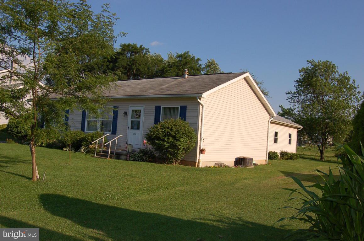 Ranch style modular home only 18 years old.Features three bedrooms,2 baths.All kitchen appliances included plus washer and dryer.Screened in breezeway with attached two car garage.Lots of off-street parking.Has small stream behind home.Has insulated attic and Anderson windows.Afforable propane heat and central air.Home/garage has never had water during Storm Lee or otherwise.