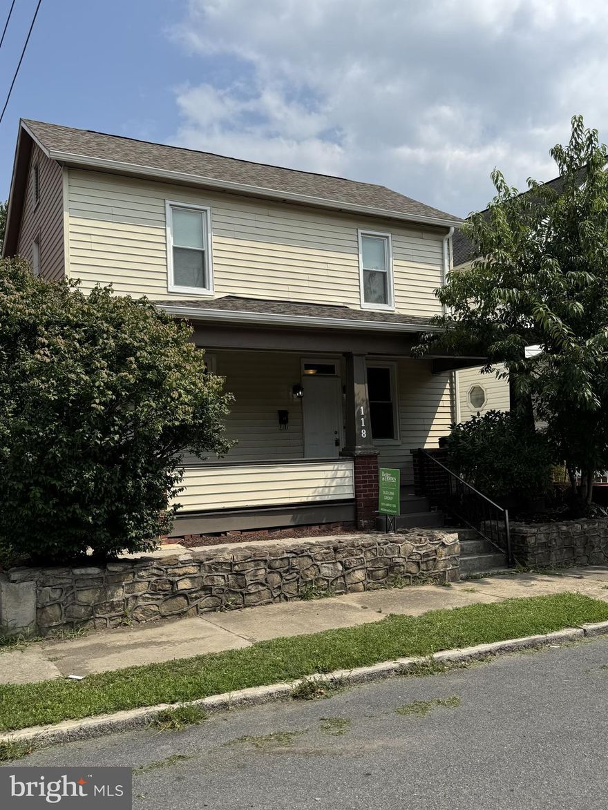 This beautiful 2-story house was fully renovated and is move in ready. The first floor of this home includes a living room, dining room, kitchen, full bath with tub and mudroom with washer and dryer hook-ups. The upstairs has two bedrooms, a half bath, a common area, and a stairway to the attic. There are beautiful hardwood floors and full-size windows. Kitchen includes a refrigerator, range, over the range microwave and dishwasher. Appliances are black and stainless steel. The wiring, plumbing and windows were all updated during renovations. In 2019, the roof was replaced and a new HVAC system was installed in 2018. The home is heated by a high efficiency heat pump forced air furnace. This home also includes a front porch, fenced in backyard, detached 3 car garage with upper storage area and private off-street parking. The rear alley dead ends at this property. 

Home is minutes from Downtown Cumberland, Allegany College of Maryland, UPMC Western Maryland Hospital, recreational parks and trails, and access to Interstate 68. It is also a short drive to Frostburg State University and Northrup Grumman in Rocket Center, WV. 

Complete List of Renovations/Updates: 

2025 - New Exterior Light Fixtures 

2024 - New Roof on Detached 3 Car Garage, New Window in Detached Garage, New Gutters & Downspouts on House & Detached Garage, New Flooring on Front Porch, Windows Wrapped in Aluminum, New Refrigerator, New Stove 

New Over the Range Microwave, New Roof on House (2019), New Heat Pump Forced Air HVAC System (2018), New Wiring in Garage, New Plumbing throughout House, New Wiring throughout House, New Insulation in House, New Bathrooms Installed, New Kitchen Installed, New Windows (Double Hung, Double Pane, Low E/Argon Vinyl) & Exterior Doors Installed, Hardwood Floors Refinished, New Hot Water Heater Installed, New Garage Doors on Detached Garage
