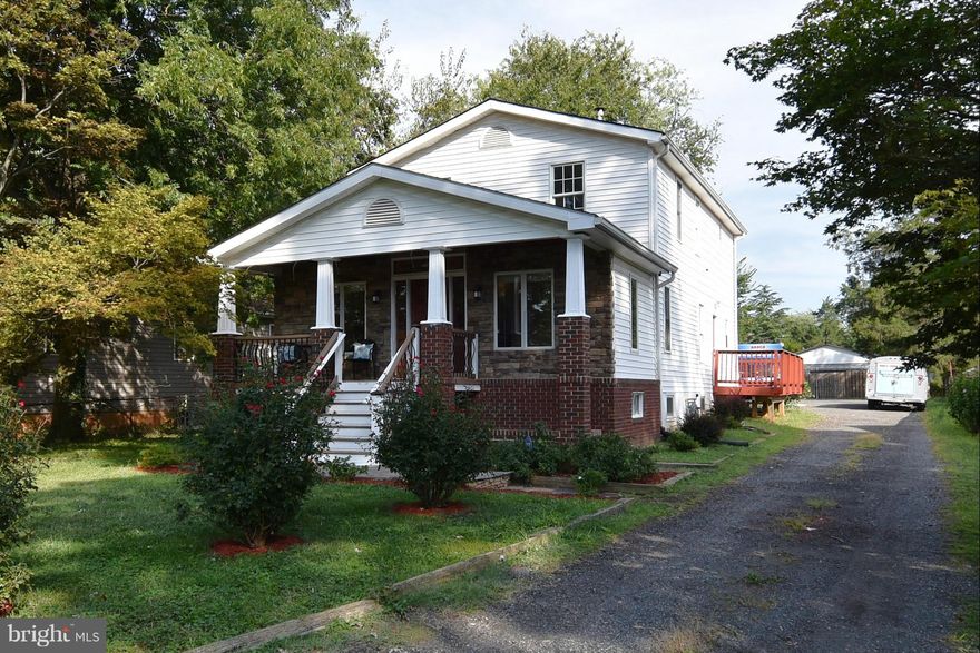 Spacious light-filled 4 bedroom, 3 bath home on half acre in central Falls Church has huge fenced-off cinder block garage, second building for workshop, and large driveway for vehicles, perfect for car enthusiasts or contractors. House has almost 3,000 square feet of open living space with bamboo floors, granite, stainless appliances, and large deck. Open Sunday 5/7 1-4 pm.