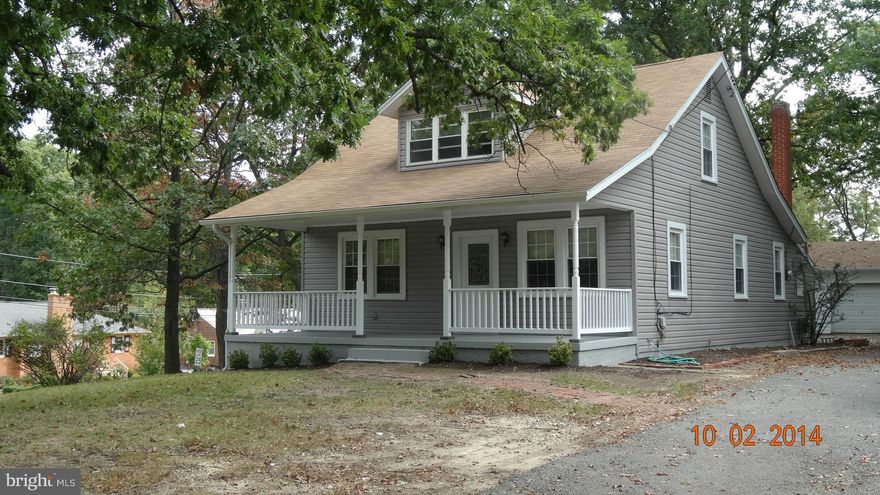 Old is now New.Renovations just completed. New Kitchen w/S/S Fridgidaire upgraded appliances; new cabinets, granite counters; ceramic baths; wood floors. Spacious 4 BR on corner lot shaded by mature trees. Full front porch. Fenced rear yard;detached 2 car garage; Near Metro; National Harbor; 495 Beltway; 295 Freeway; Nationals Stadium.