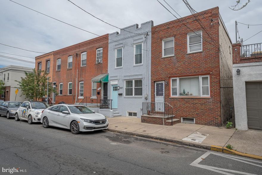 So excited to introduce you to 1007 Mifflin St.  a sexy, beautiful and extremely well built brand new rehab with all new systems and 2 outdoor spaces, it is centered in the most amazing area which is our Passyunk Square/EPX / Bok neighborhood...This home has tons of character and light with the wonderful real brick front it possesses .. Enter into an amazing open floorplan that includes incredible real oak hardwood floors throughout that shimmer in the natural sunlight, open living area plus separate dining area with recess lighting, nice ceiling height, restored original staircase, handcrafted mouldings/wainscoting plus a convenient half bath with contemporary finishes and vanity. The living space flows brilliantly into a gorgeous Chef's kitchen that is so made for the foodie in you it contains a separate island butcher's block prepping station with underneath storage and microwave, surround handcrafted cabinetry, sleek quartz countertops, a mixture of white subway tile and a pop of pizzazz with black hex tile backsplash, Frigidaire stainless steel appliances and range hood. Our kitchen flows out to a relaxing and spacious backyard patio space perfect for dining al Fresco or your new garden! The 2nd floor is just as perfect as the first with those shimmering oak hardwoods, high end custom doors and trim work that are finished perfectly, Primary Bedroom is lovely and spacious with nice closet space and its own full Spa bath, it's Luxe living at its finest and is finished with Porcelain and intricate high end tile finishes, full vanity storage space with quartz counter and incredible golden finish fixtures. The hallway bath is also full and finished beautifully with white subway and black penny tiles, full tub and sleek finishes plus quartz top vanity. Back bedroom is a great size and also contains a separate closet. 2nd floor leads you to the icing on the cake which is a breathtaking roof deck with the amazing views of our great city! You can see the fireworks at Citizen's Bank Park, the beauty of the Bok building and the rest of our beautiful city!  This home is solid and has been completely redone, all new windows, new energy eff. HVAC , new electric etc. Clean full basement has been fully painted and is great for storage as well.  The location can not be beat your in the center of all that city living has to offer! 2 blocks from the historic Bok building with its great renaissance, 2 blocks from East Passyunk Ave world class dining scene You can walk or bike anywhere also located in the Southwark school district! Visit the local eatery's you have Bok, Watkins Drinkery, Artisan Boulanger, Korshak Bagels all in a 2 block radius.  Walkscore gives this a 97! come today be part of this wonderful happening!
