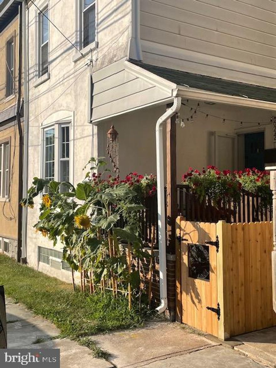 Welcome home to this enchanting 4 bedroom/1 bath twin located in the beautiful and historical 
 neighborhood of Roxborough.  You will love that the side and back yard are contained via a lovely fence.  As you approach the front door you will notice an adorable porch, perfect to enjoy your morning cup of coffee.   Beautiful  wood  flooring and crown molding and an abundance of natural light throughout the first floor in the living room, dining room and kitchen.  The living room has recessed lighting and a lovely bay window.   The spacious dining room has plenty of room for guests.   You will find plenty of pretty white cabinetry  and an island in the cheerful kitchen.    Up the very  attractive staircase to the second floor which offers 2 large bedrooms and a full bathroom that has tile surround and a tile floor.    Bedroom 1 has a large cedar closet and ceiling fan.  The third floor has 2 additional rooms.  One is a bedroom with big closet and another room currently used as an office but could be a bedroom.   This home has an amazing fenced in  backyard, perfect for dogs and barbeques.  The house has been well taken care of and it has wonderful aesthetics and details. The seller has so enjoyed living here as it is close to so many amenities including the  New Ridge Brewery  Co. and Gorgas Park, where you can enjoy concerts and festivals and which also has an area for dogs to play.  Wissahickon Park is only about two blocs away so you can immerse yourself in  the natural beauty and forget that you in the city.  Manayunk's Main Street which has plenty of shops and eateries is easily accessible as well.   Call now to this wonderful home.  You will be so glad that you did.  Home warranty included!