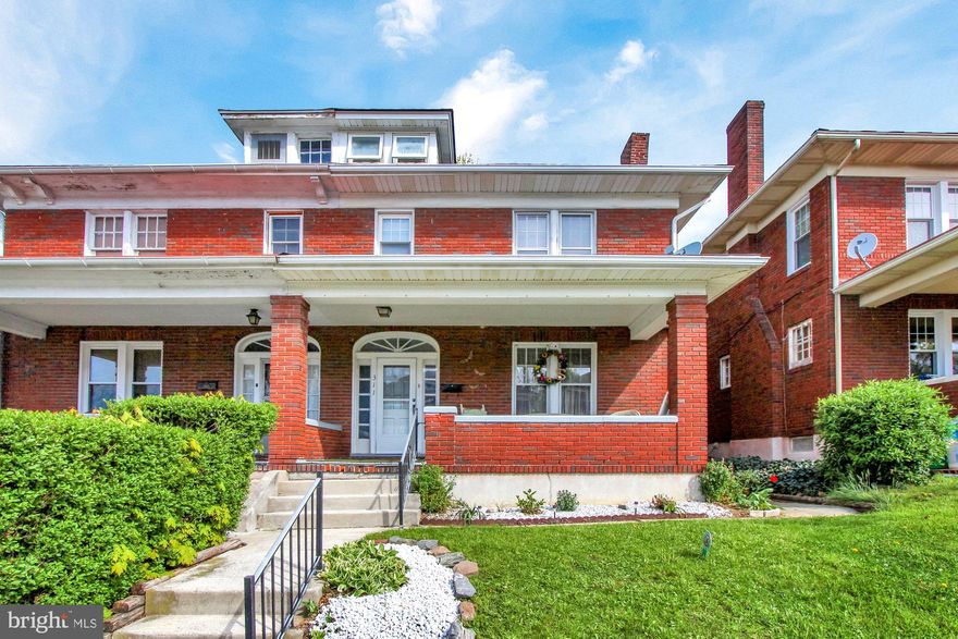 Brick semi detached home located on quiet one way street just blocks from York College and many conveniences!  Inviting front porch and decorative door with side lights lead to spacious living room offering beautiful hardwood floors and wood burning brick fireplace.  Separate dining room and eat in kitchen include appliances.  Second floor features 3 bedrooms and full bath.  Attic is great storage space and opportunity for 4th bedroom or office.  Laundry is located in basement, washer and dryer stay.  Plenty of additional storage in basement!  Nice private backyard  with recent vinyl fencing and off street parking.  One year Cinch home warranty provided to buyer at settlement.