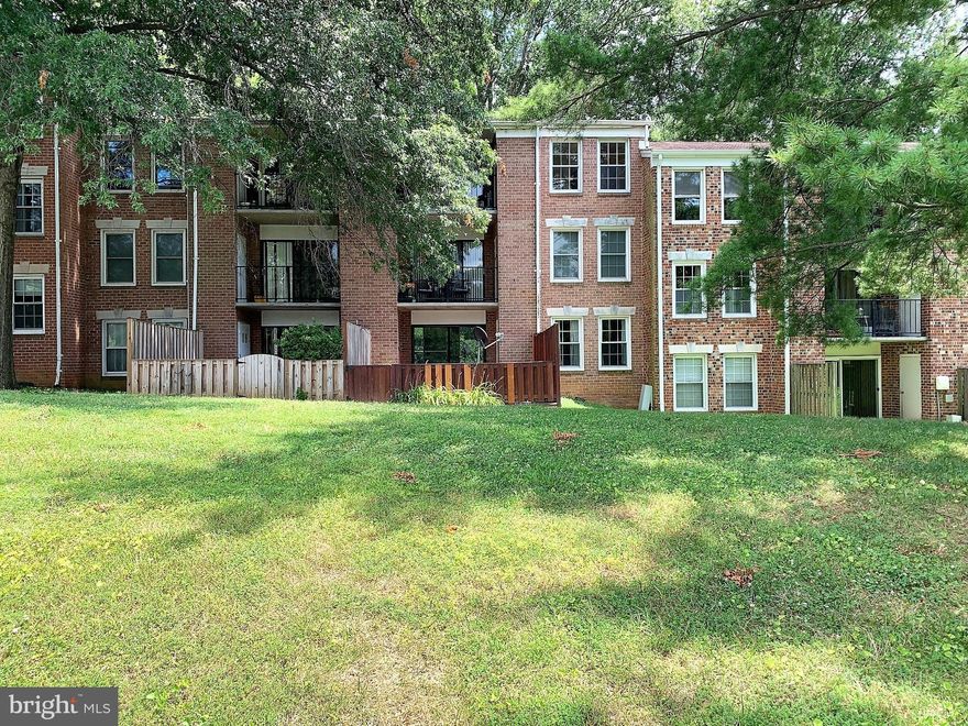 Your lucky day - buyer's financing fell through - so we are back on the market. Welcome to 848 Quince Orchard Blvd Unit OP1. First level 2 bedrooms 1  bathroom condo located in Potomac Oaks Condominium with large deck and fenced in backyard! Enter into a spacious living room and formal dining room. Parquet wood floors. The  primary bedroom is spacious with a walk-in closet. 2nd large bedroom .  This home is conveniently located directly across from the elementary school, bus stop (MoCo Bus 56), and just minutes to parks, shopping, dining, I-270, and more. Condo fee includes electric, gas, water/sewer, and trash . One assigned parking space.  Many extra Visitor spots also available.  Lock secured laundry room is directly across hall. Enjoy the nice clubhouse and large pool just a short distance from the unit! Condo is pet friendly.