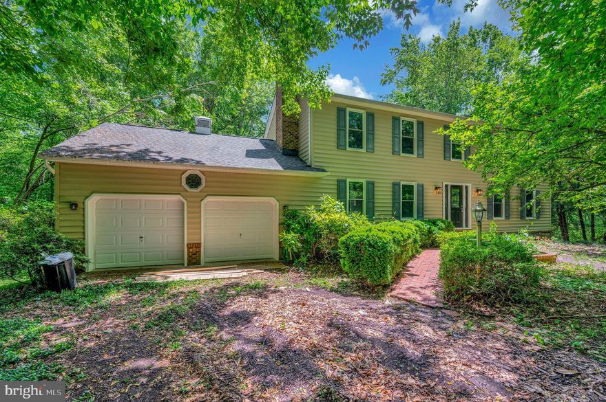 PRICE REDUCED!! You won't want to miss this absolutely stunning 6+ bedroom house in King George on a private cul-de-sac with just over 1.5 acres! Lots of natural light and privacy. With over 4000+ finished sq ft- this entire house has been fully remodeled to include beautiful luxury vinyl plank flooring, crown molding, chair railing, recessed lighting, ceiling fans throughout, new carpet, spacious bedrooms, and so much more! ...This gourmet kitchen includes beautiful tile floors, quartz countertops, white cabinets, tile backsplash, stainless-steele appliances and new custom fixtures.  Lots of counterspace and plenty of room for a table as well as a nice formal dining room. Cozy living room with gas fireplace and plenty of room for the family. Main level laundry and large two car garage. Upstairs features small loft area or reading nook as well as large bedrooms. The primary suite is a good size with large walk in closet and beautiful spa-like bathroom with soaking tub, dual vanities, and walk in shower. Every bathroom has been upgraded to include tile floors and showers. Fully finished walk out basement with recreation room, built ins, two bedrooms, storage area, and secondary den with wood stove, and plenty of room to spare. Walkout onto your large two story deck leading to a private backyard with wooded views. Plenty of room to park on private cul-de-sac. Convenient location close to everything King George has to offer and not far from Fredericksburg. Come and tour this property today!