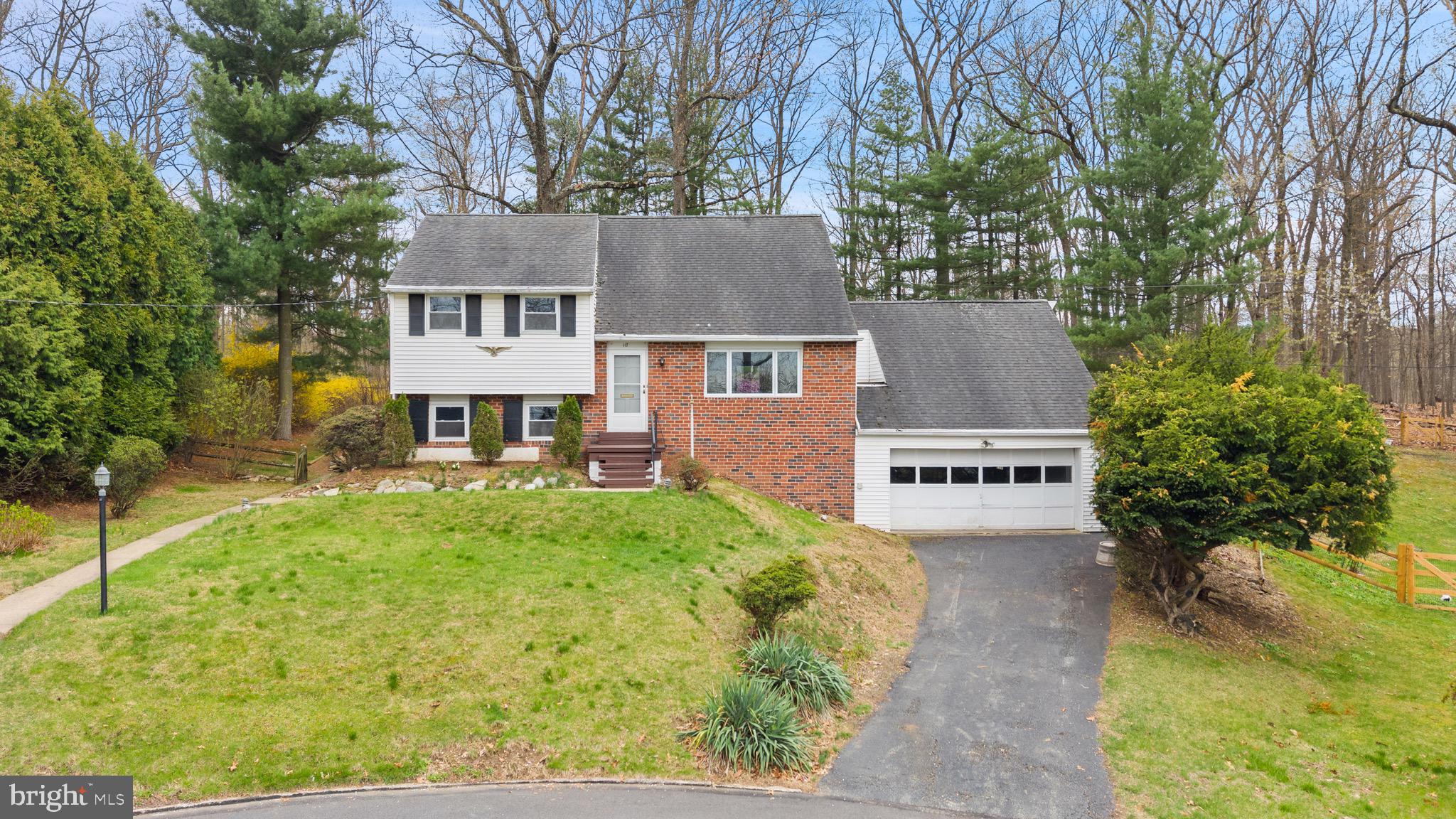 Unique opportunity in Malvern. This 3/4 bedroom 1 1/2 bath split level home sits on just over 4.6 ACRES OF UNDISTURBED LAND. Available for the first time since its construction in 1960, the possibilities are endless. Entering the split level home located at the end of a quiet cul-de-sac one is greeted by freshly painted walls and hardwood floors throughout. Large windows and sliders allow light to fill the entire space. The second level boasts three bedrooms and one full bath. Continuing to the third level one finds a converted attic fourth bedroom. The lower level offers another light filled living space with powder room and laundry. Workshop, basement and 2 car garage with lofted storage allow for extra storage and workspaces. The treasure is found outside. Relax on the deck and enjoy the peaceful sounds of nature. Hike through the wooded lot and look out over Duffy’s Cut. Plan to expand the current home or build your dream home on the expansive lot. Close to the heart of Malvern with all its charms and seasonal events, fairs and celebrations. Convenient to shops, restaurants, train, Route 202 and the PA Turnpike. Home is being sold “As Is” **PHOTOS COMING SOON***