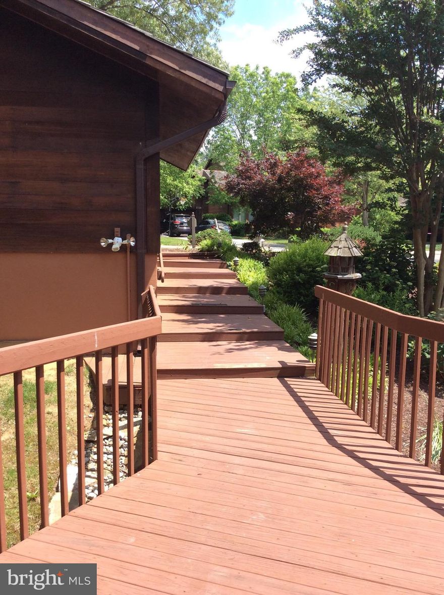 Exclusive Lakeside Villa located in the heart of the Woodmore Gated Community. Perfect for a vacation home, AirBnB or just Home Sweet Home; Stainless steel appliances; Wraparound Deck with Lakeview, great for entertaining; Basement features, Wet bar; Laundry Room, Cedar closet; Stone Covered patio ;Partially finished room (Potential for a fourth bedroom..)...Waiting for Your Personal Touch Accessible amenities:Golf Course; Community pool; Woodmore Country Club !! This Opportunity Wont Last!! Property is "As Is" Due to Co-vid restrictions, all guest must wear masks and use hand sanitizer. We Must Keep Everyone Safe ! ALL OFFERS DUE BY June 14, 2021.   5PM