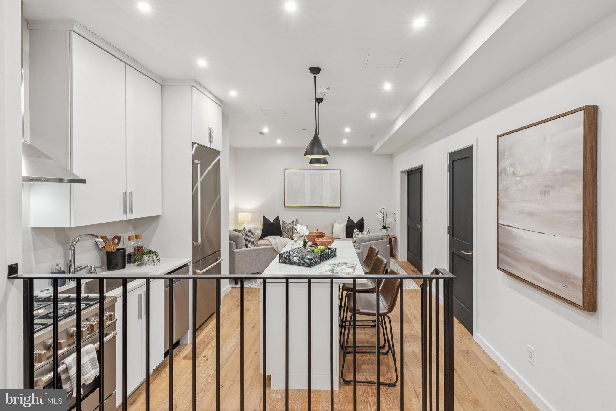 Turnkey, brand new construction at The Estate Homes at Parc Rittenhouse. Residence 215 offers a unique opportunity to live in brand new, high-end construction on Rittenhouse Square. This one bedroom, one bathroom is the epitome of luxury living. The home features hardwood floors, high ceilings, recessed lighting, and a Juliet balcony overlooking the building's beautifully landscaped courtyard. The open kitchen boasts Bertazzoni stainless steel appliances, quartz countertops and backsplash custom cabinetry, and an island. The beautifully tiled bathroom has an oversized vanity, large shower with seamless glass door and a stackable washer/dryer. The bedroom is separated from the living room with a stylish farm door. There is excellent closet space throughout. Residents of The Estate Homes at Parc Rittenhouse enjoy two secure elevators for only 20 homes which provides direct access to the garage, lobby and amenities floor, in addition to the same amenities as the other homes at Parc Rittenhouse, including a 24 hour doorman and concierge; landscaped 7th floor rooftop with outdoor pool, whirlpool spa, kiddy pool, and sundeck with lounge chairs; brand new state-of-the-art fitness center; conference room and media room. There is garage parking below the building for an additional fee and two amazing restaurants on the ground floor, Stephen Starr’s Parc and Via Locusta. Rittenhouse Square is ranked the 6th best neighborhood in North America by Places Rated Almanac. There are 175 restaurants and 199 retailers within a three block radius. Within close walking distance to the Market Street office corridor, The Avenue of the Arts and University City. 30th Street Station and Philadelphia International Airport are only minutes away.