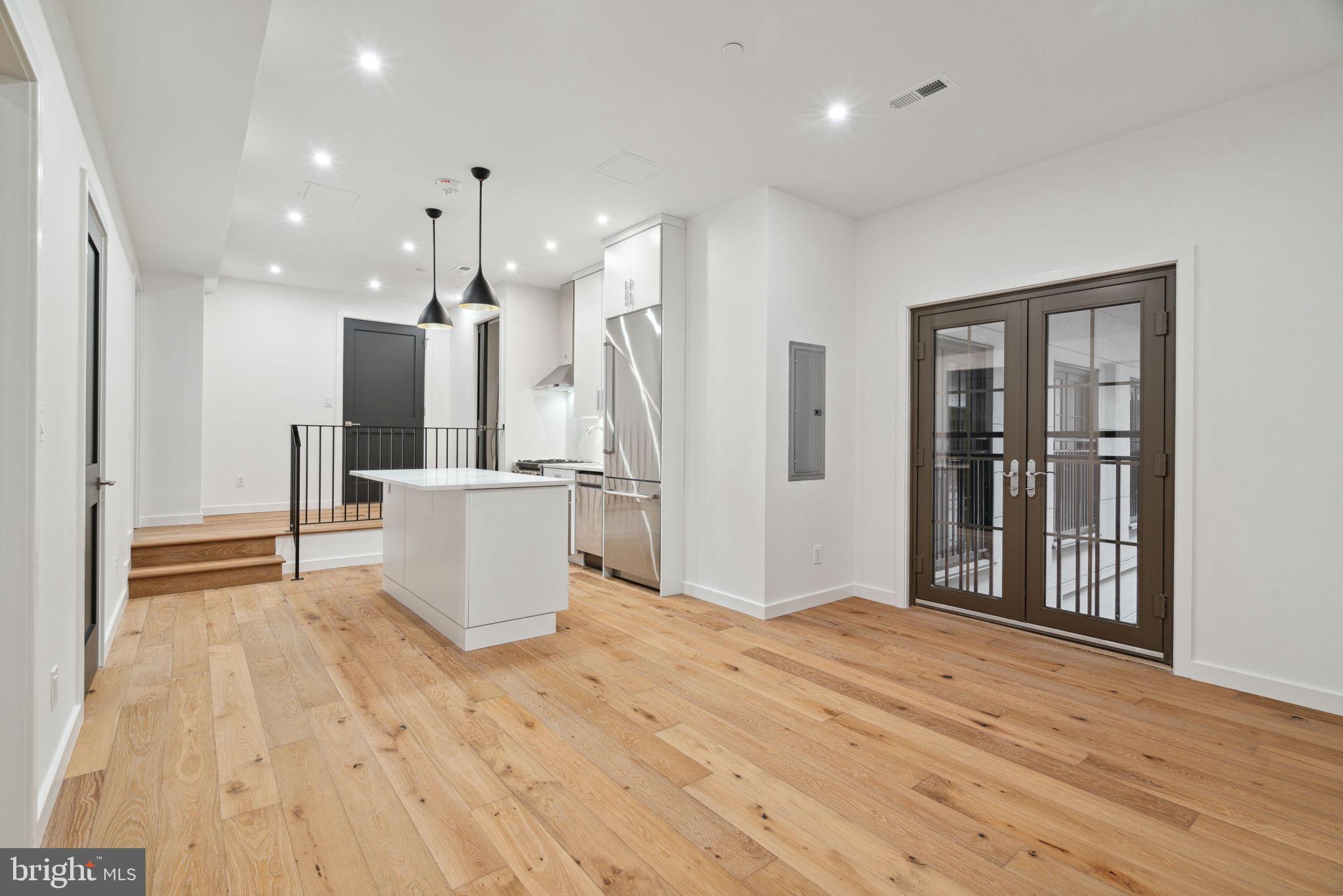 Turnkey, brand new construction at The Estate Homes at Parc Rittenhouse. Residence 215 offers a unique opportunity to live in brand new, high-end construction on Rittenhouse Square. This one bedroom, one bathroom is the epitome of luxury living. The home features hardwood floors, high ceilings, recessed lighting, and a Juliet balcony overlooking the building's beautifully landscaped courtyard. The open kitchen boasts Bertazzoni stainless steel appliances, quartz countertops and backsplash custom cabinetry, and an island. The beautifully tiled bathroom has an oversized vanity, large shower with seamless glass door and a stackable washer/dryer. The bedroom is separated from the living room with a stylish farm door. There is excellent closet space throughout. Residents of The Estate Homes at Parc Rittenhouse enjoy two secure elevators for only 20 homes which provides direct access to the garage, lobby and amenities floor, in addition to the same amenities as the other homes at Parc Rittenhouse, including a 24 hour doorman and concierge; landscaped 7th floor rooftop with outdoor pool, whirlpool spa, kiddy pool, and sundeck with lounge chairs; brand new state-of-the-art fitness center; conference room and media room. There is garage parking below the building for an additional fee and two amazing restaurants on the ground floor, Stephen Starr’s Parc and Via Locusta. Rittenhouse Square is ranked the 6th best neighborhood in North America by Places Rated Almanac. There are 175 restaurants and 199 retailers within a three block radius. Within close walking distance to the Market Street office corridor, The Avenue of the Arts and University City. 30th Street Station and Philadelphia International Airport are only minutes away.
