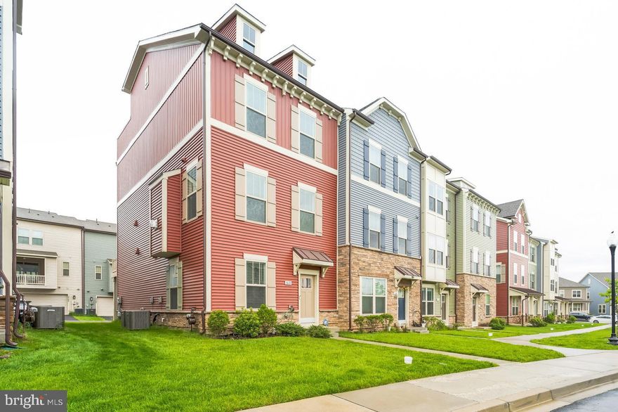 Welcome to 8638 Satinwood Dr – a stunning end-unit townhome offering nearly 2,400 square feet of stylish, sun-drenched living space across four expansive levels. This exceptional 5-bedroom, 4.5-bath residence blends modern design with everyday functionality, featuring LVP flooring on the first three levels. The open concept gourmet kitchen features gorgeous quartz countertops, upgraded fixtures and a beautiful stainless steel farmhouse sink. Natural light pours in from three sides, enhancing the open layout and highlighting the high-end finishes throughout. Enjoy outdoor living at its finest with a spacious rooftop deck, perfect for entertaining, and a main-level deck ideal for morning coffee or evening relaxation. The two-car garage provides convenient parking and storage. Located in the sought-after Urbana community, this home is just minutes from nearby schools, parks, shopping, and commuter routes.