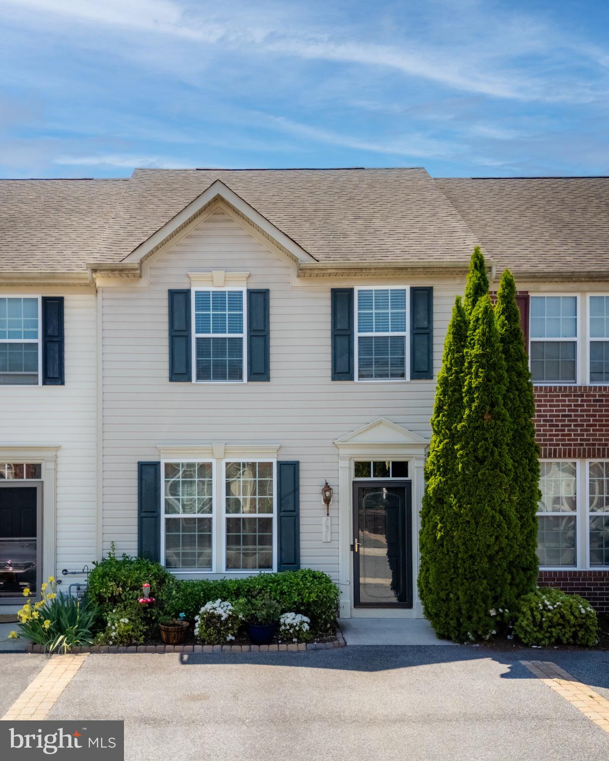 Welcome to this beautifully maintained 3-bedroom, 2.5-bath townhouse in the desirable Cedar Commons community of Fruitland. This spacious two-level home offers a bright and inviting layout, with windows that flood the space with natural light. The kitchen features ample cabinetry and counter space, perfect for cooking and entertaining, with direct access to the private backyard—ideal for relaxing or enjoying outdoor meals. Upstairs, the primary bedroom serves as a true retreat, complete with its own en-suite bath and a generous walk-in closet. Located in a vibrant and well-kept neighborhood, Cedar Commons is just minutes from Salisbury University, Fruitland's parks and recreation areas, shopping, dining, and only a short drive to Maryland’s Eastern Shore beaches. Whether you're a first-time buyer or looking to simplify, this home combines comfort, convenience, and community charm.