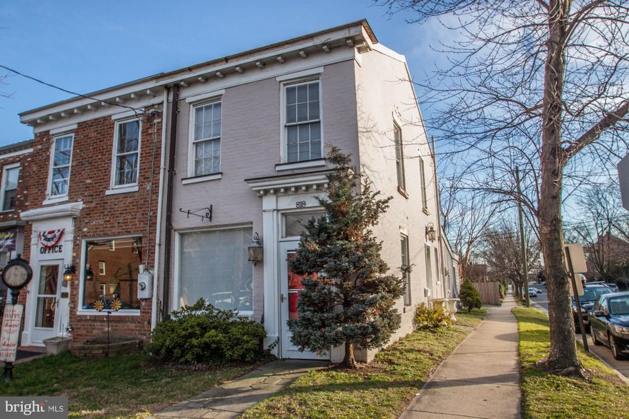 This historic two bedroom plus 1 1/2 bath end townhome awaits your creative eye!  Circa 1820 and located on a 1,500 square foot corner lot, this is your opportunity to transform this townhome into a charming Old Town residence or office building.  Please note that the zoning is CL (commercial low).  Building can be used residentially or commercially or a combination thereof.  This unique building offers high visibility and easy parking!  plus room for expansion on the rear of building.  Close to shops, restaurants and the Potomac River.  Sold "as is".