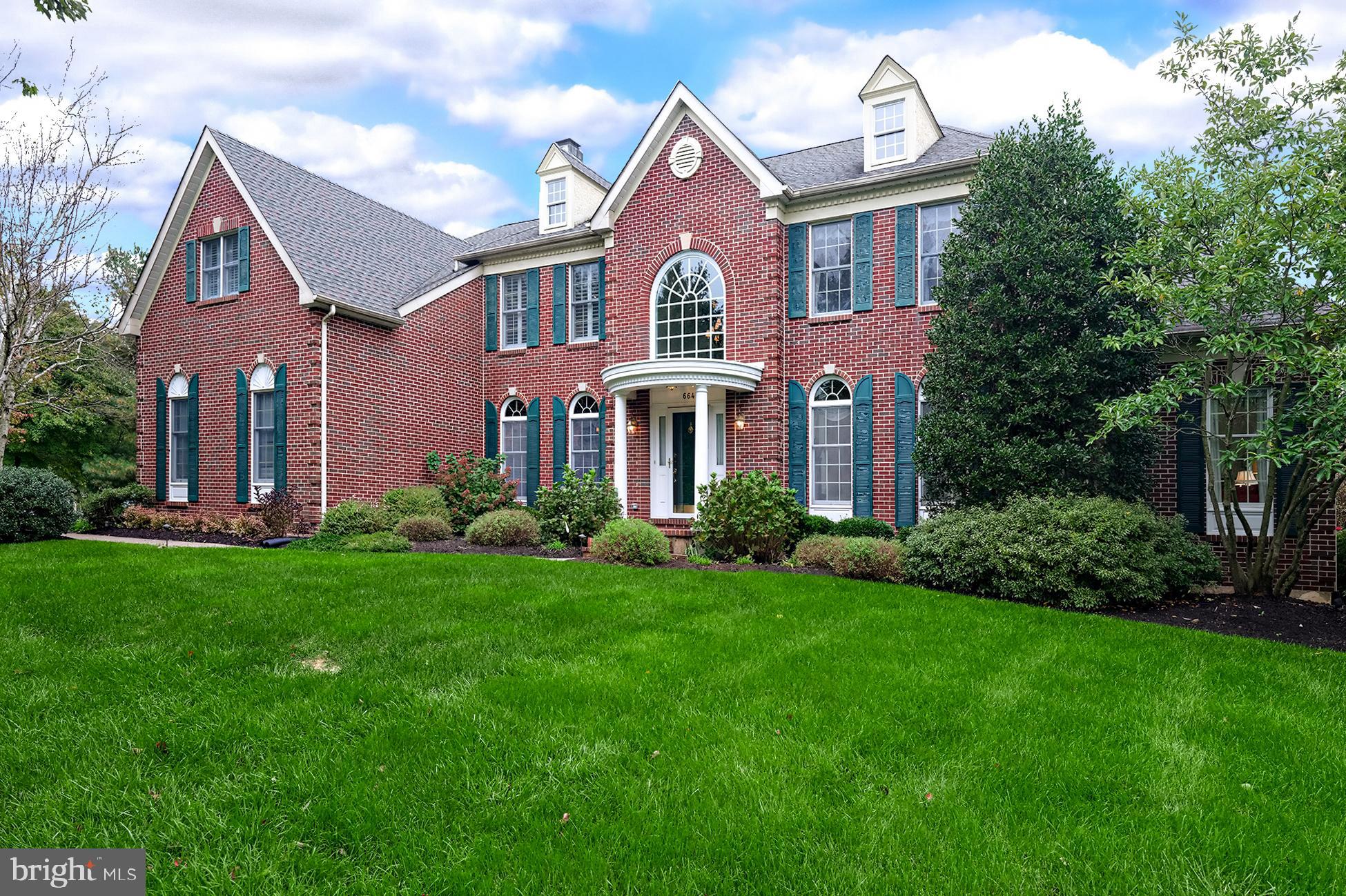 Offering the tranquility of Yardley Estates, tucked on a lush lot with plenty of outdoor space, but just minutes to 295 and the SEPTA, this substantial home has a wonderfully warm ambiance. Comfortable open spaces make for carefree living. Choose to work from home in the office or in the privacy of the main suite. Expansive natural light filled conservatory offers many uses ...wet bar, built-in office area or entertaining. Dining and living rooms are formal while the family room and kitchen span the rear of the house just beyond. Designed for entertaining, the kitchen features two of almost every appliance. A floor to ceiling brick fireplace is cozy in winter, while sliders reach the deck, gazebo, and yard for summer fun. The office is sheathed in handsome shelving. Upstairs find the homeowner’s bedroom with a sitting room, a bonus room for an office or home gym, a private five-piece bath, and a fireplace. Three other bedrooms boast generous closet storage. Both the updated hall bathroom and powder room aid in the morning rush. The fully finished basement with the media and game room is designed for gatherings and movie nights. This one has it all!