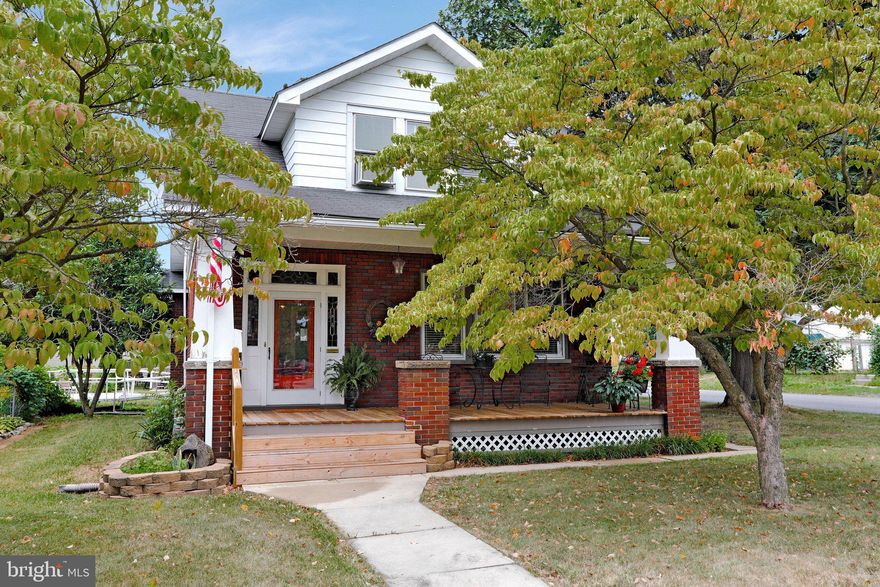 Charming home in excellent condition on a beautiful corner lot.   Updated kitchen, high quality interior wood and trim work throughout the home.  Spacious front porch and a 2-car detached garage.  This is a special home - schedule your showing today. Close to shopping and dining and a great commuter location!