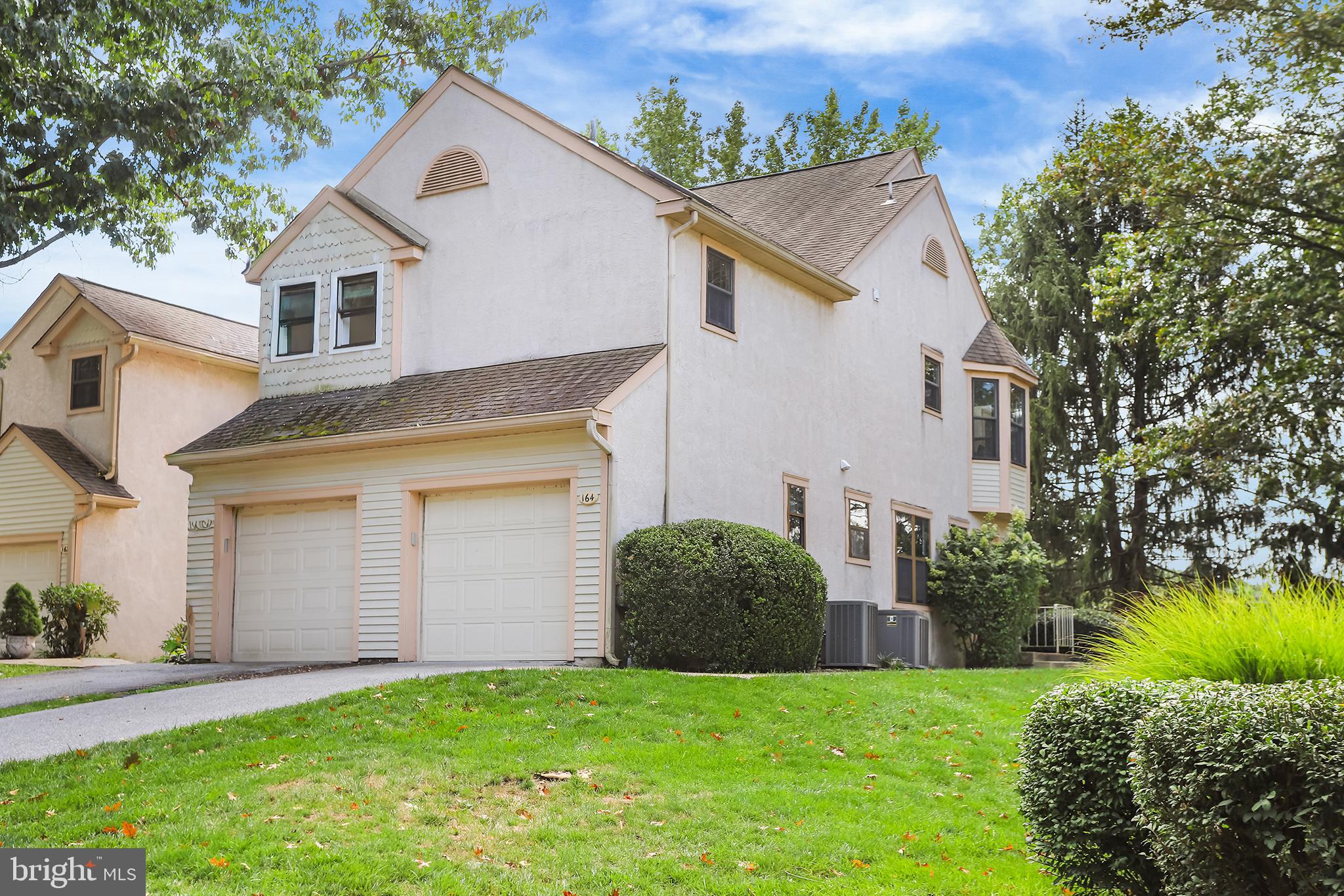 Welcome to this charming end-unit townhome located just minutes from downtown West Chester. Tucked into a quiet community with beautiful wooded surroundings, this two-bedroom, two-bathroom home offers the perfect combination of privacy, comfort, and convenience. Inside, you'll find a bright and open living space with large windows that bring in natural light and offer serene views of the private wooded setting. The kitchen is both functional and inviting, with ample cabinetry, quality appliances, and a layout that flows easily into the dining and living areas—ideal for entertaining or everyday living.
The home features two generously sized bedrooms. The primary bedroom includes its own attached full bathroom, offering a private retreat, while the second bathroom is conveniently accessible from the hallway, perfect for guests or shared use. As an end unit, this townhome provides added privacy and outdoor space, along with the peaceful benefit of fewer shared walls. Whether you’re sipping coffee on the patio or enjoying a quiet evening at home, you’ll love the peaceful wooded views that make this property feel like a hidden escape—while still being just moments away from the restaurants, shops, and energy of downtown West Chester.
