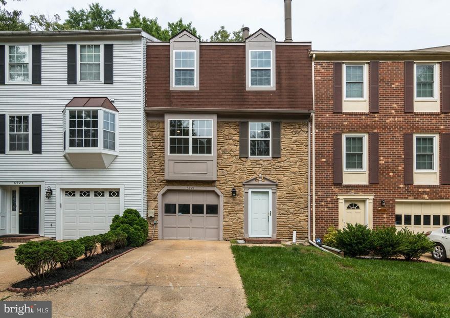 THIS BEAUTIFULLY RENOVATED 3-LEVEL GARAGE TOWNHOME WILL NOT DISAPPOINT! The kitchen will impress any buyer and is highlighted by the granite counters, new stainless steel appliances, and beautiful cabinetry.  Gorgeous hardwood flooring and new carpet throughout!  Renovated bathrooms with new vanities and custom tile.  Fully finished lower level with fireplace and bar area. A MUST SEE!