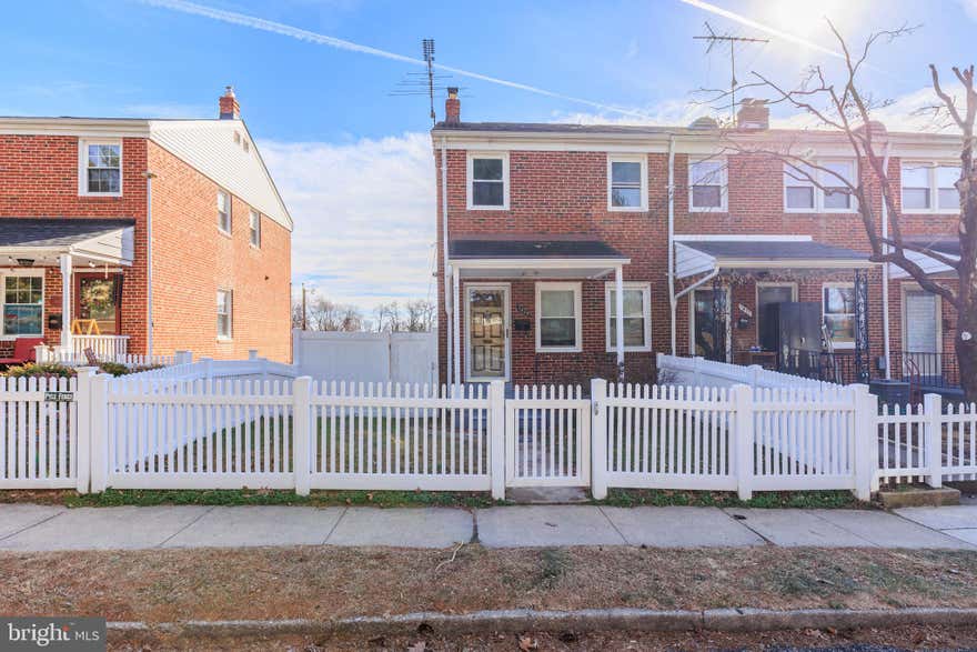 Welcome to 1449 Roland Heights Ave, nestled in Baltimore’s desirable Medfield neighborhood. This brick home offers a bright, inviting layout with tasteful updates throughout. The updated kitchen features white shaker cabinetry, granite countertops, stainless steel appliances, pendant lighting, and a breakfast bar that opens nicely for everyday living and entertaining. Enjoy beautiful hardwood floors and generous natural light in the living spaces. Upstairs, you’ll find **two spacious bedrooms** with hardwood flooring and great closet space. The updated full bathroom includes a granite-top vanity and a tiled shower with a sleek glass door. The finished lower level provides flexible bonus space—perfect for a family room, home office, gym, or movie room—and includes a **convenient half bathroom**, plus additional storage and walk-out convenience. Don’t miss the enclosed rear sunroom, an extra space to relax year-round. Conveniently located near parks, dining, shopping, and commuter routes—schedule your private tour today!