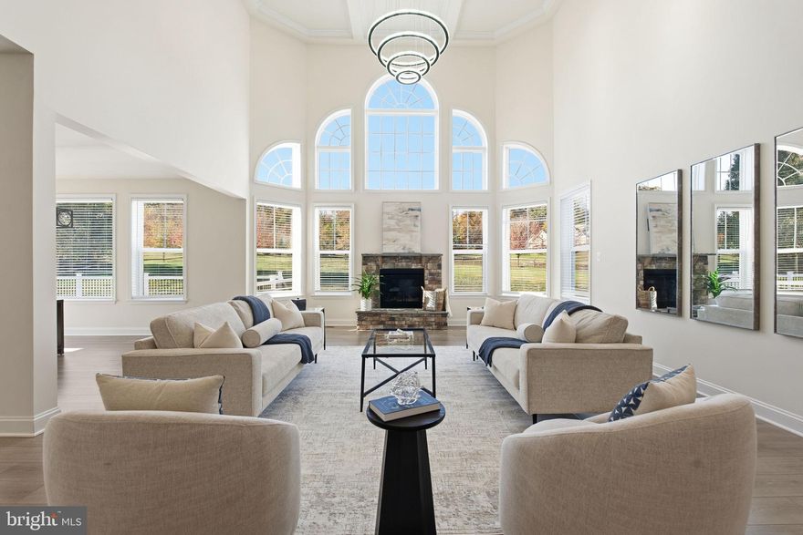 Welcome to this exceptional estate, built in 2021 and nestled on 1.71 fully fenced acres. With over 6,600 sq ft of beautifully finished space, this home combines luxury, comfort, and thoughtful design at every turn.

The gourmet kitchen is a true centerpiece, featuring a 5-burner gas cooktop and hood, double wall ovens, walk-in pantry, and an extended island with extra cabinetry. It opens to a stunning great room with coffered ceiling and gas fireplace, perfect for both everyday living and entertaining.

Enjoy flexible living with a main-level bedroom and full bath, private office with French doors, and a fully finished walkout basement complete with a wet bar, home theater, rec room and full bath.

The extended owner’s suite offers tray ceilings, double walk-in closets, a separate temperature control system, and a California spa bath with a freestanding soaking tub, dual shower heads, and dual vanities.

Outside, unwind on the oversized Trex deck or take a dip in the in-ground pool—your private retreat awaits.This is luxury living designed for real life.