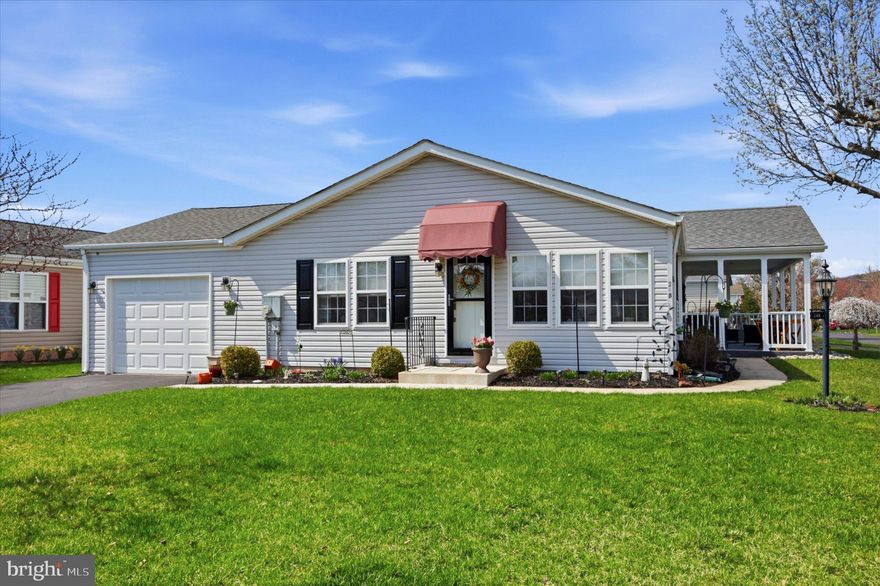 This charming and beautifully updated Buckingham Springs Rancher with Garage is absolutely Gorgeous inside & outside!! It offers a perfect blend of comfort and luxury, inviting you to embrace a vibrant lifestyle. Step inside to find a spacious layout featuring two well-appointed bedrooms and two full bathrooms, providing ample space for relaxation and privacy. Enjoy the beautiful Kitchen w/ Skylight, dining room, breakfast room, living room & family room areas all beautifully designed! The home boasts high-end finishes and thoughtful design elements that create an inviting atmosphere, perfect for entertaining or enjoying quiet evenings at home. The community amenities elevate your living experience, with a stunning outdoor pool and a welcoming clubhouse that fosters a sense of camaraderie among residents. Whether you're lounging by the pool or engaging in community activities, you'll find a wealth of opportunities to connect and thrive. Enjoy the convenience of an attached garage and driveway parking, ensuring easy access to your home. Just outside the Dining Room area is a Beautiful and spacious Patio with overhang and railings!! The exterior also features an additional pavor block patio, durable vinyl siding & architectural roof shingles combining aesthetic appeal with low maintenance, allowing you to spend more time enjoying your surroundings. This property is not just a home; it's a gateway to a lifestyle filled with comfort, luxury, and community. Experience the best of senior living in a serene environment that prioritizes your well-being and happiness. Embrace the next chapter of your life in Buckingham Springs, where every day feels like a retreat. This home is absolutely gorgeous with beautiful design & neutral decor throughout!! All rooms have been thoughtfully planned out and designed!! A Gorgeous must-see Kitchen!!