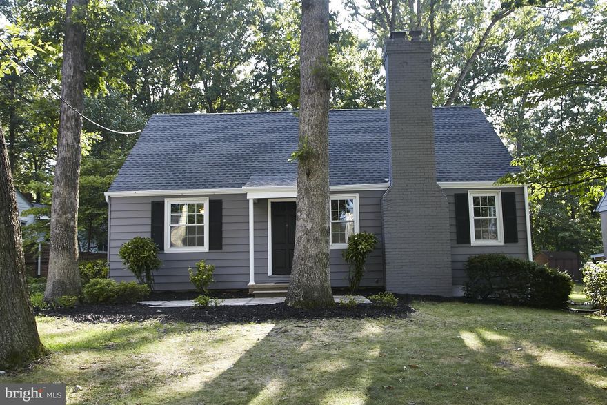 Beautifully renovated home with all new amenities! Granite kit with breakfast bar opens to DR & LR with brick fireplace! Large sunroom with HVAC for year round enjoyment! 2 Spacious upstairs BR's with fantastic views of private yard. 2 main level BR's. Spacious finished basement and roomy above grade finished space of 1732 sq ft! SDAT sq ft records not updated to include sunroom.