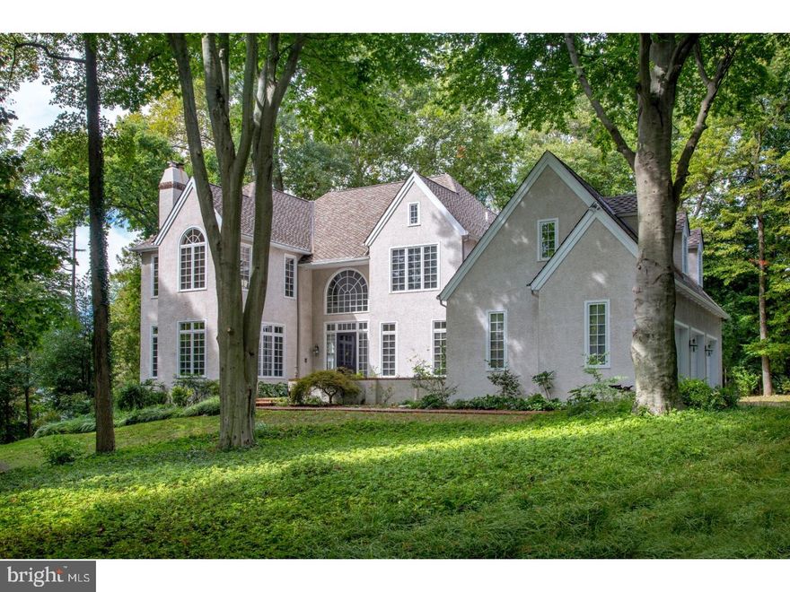 First time offered for sale! Custom designed by Ann Capron and built by Michael Cutler as his own residence in 1993, this classic English country home, with gardens, surrounded by estate/deer fencing, sits on a quiet cul-de-sac in Gladwyne.  Features include 10' 1st floor and 9' 2nd floor ceilings, an overabundance of architectural windows, spacious light filled rooms, and every amenity desired by the discerning buyer. Entering into the 2 story foyer provides a view of both light-filled formal living and dining spaces with views to the patio and gardens. Also off the entry is a spacious den/office with a full wall of custom bookcases, a fireplace and views of the private entry garden out to the front yard. Transitional Rutt kitchen, with separate eating area, features a center island with space for 3 stools, granite counters, all wood cabinetry, top-of-the-line appliances and a built-in desk area. The kitchen is directly adjacent to a large, 2 story family room with fireplace and access to the rear patio. Other main floor highlights include a spacious laundry room, 2 closets- 1 walk-in, direct access to oversized 3 car garage, 2 powder rooms, stairs to upper level, and a door to the rear yard. Upstairs is a large master suite with tree views, walk-in closets, bath with custom double vanity, spa tub and all marble shower. Bedroom #2 en suite, bedrooms #3 & #4 share a hall bath, #5th bedroom with private bath that can be accessed from a back stair or through bedroom #4.  Two cedar closets and a luggage closet. The fully finished lower level has a full bath, a second office, a great room with built-in entertainment/storage unit, a finished storage room or workout room with walk-in closet and a large unfinished storage/mechanical area. The beautifully landscaped yard features many mature trees, a custom designed brick path from the driveway to the front entry courtyard and great spaces for both family play and entertaining.